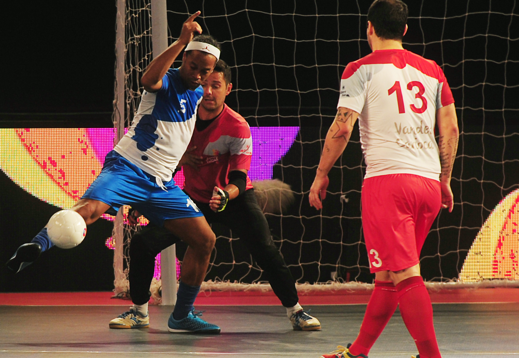 Ronaldhino (L) from the Goa 5's plays against the Kolkata 5's  during their Premier Futsal Football League match in Chennai on July 15, 2016. / AFP / ARUN SANKAR        (Photo credit should read ARUN SANKAR/AFP/Getty Images)