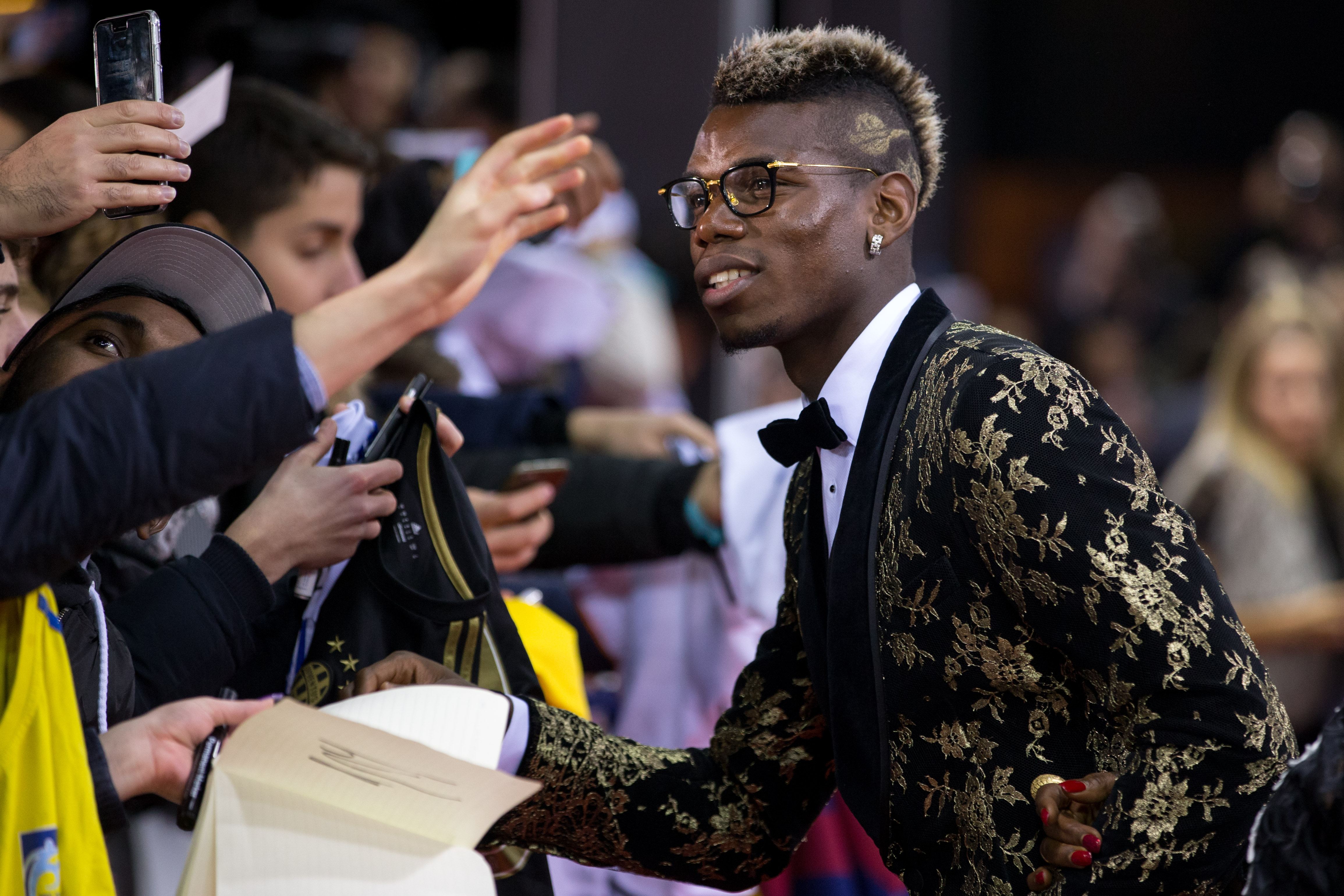 ZURICH, SWITZERLAND - JANUARY 11: Paul Pogba arrives for the FIFA Ballon d'Or Gala 2015 at the Kongresshaus on January 11, 2016 in Zurich, Switzerland. (Photo by Philipp Schmidli/Getty Images)