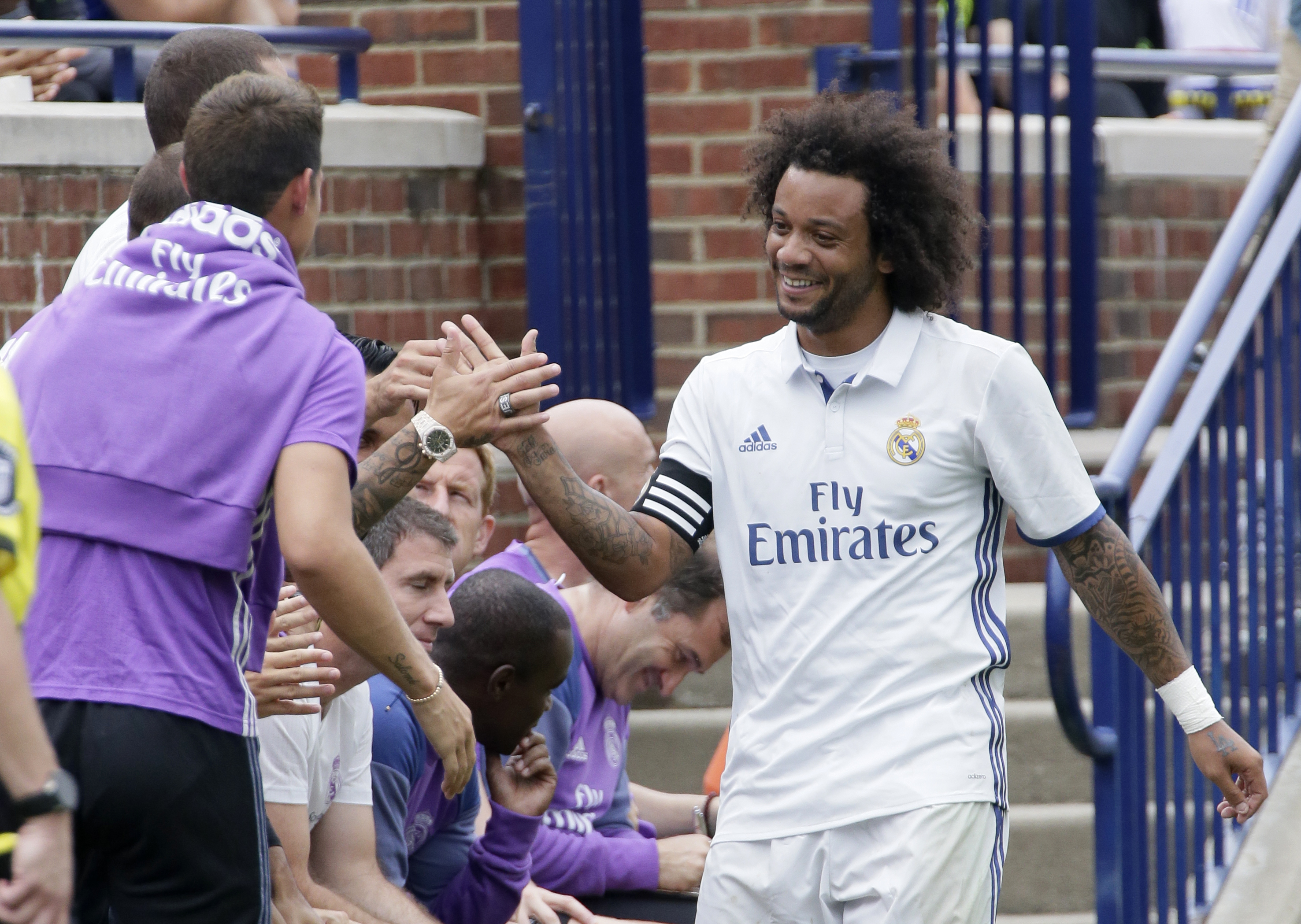 ANN ARBOR, MI - JULY 30:  Marcelo Vieira Da Silva #12 of Real Madrid is congratulated after scoring a goal against Chelsea during the first half at Michigan Stadium on July 30, 2016 in Ann Arbor, Michigan. (Photo by Duane Burleson/Getty Images)