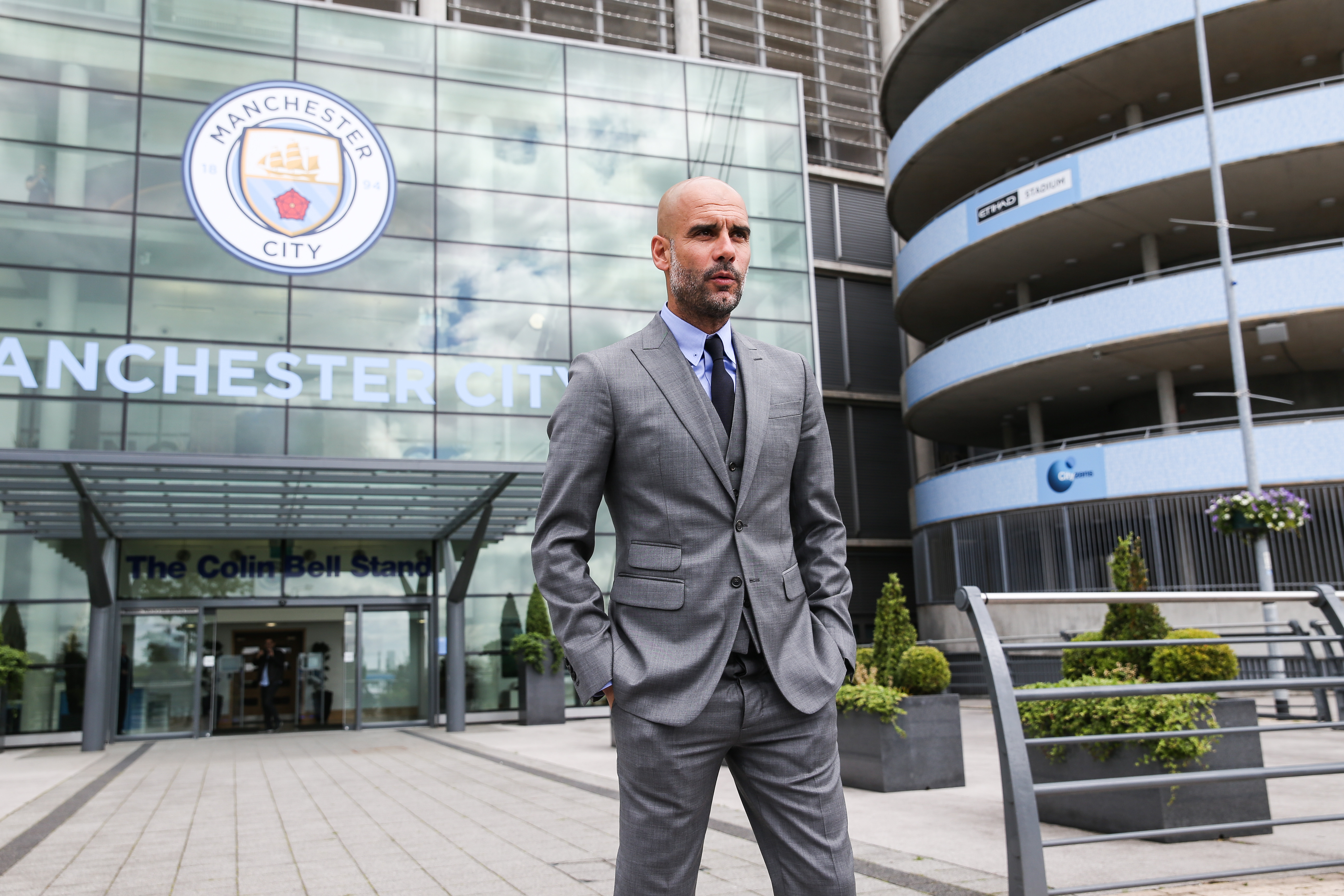 MANCHESTER, ENGLAND - JULY 08: Manchester City's manager Pep Guardiola poses for photographs outside the Etihad Stadium on July 8, 2016 in Manchester, England. (Photo by Barrington Coombs/Getty Images)