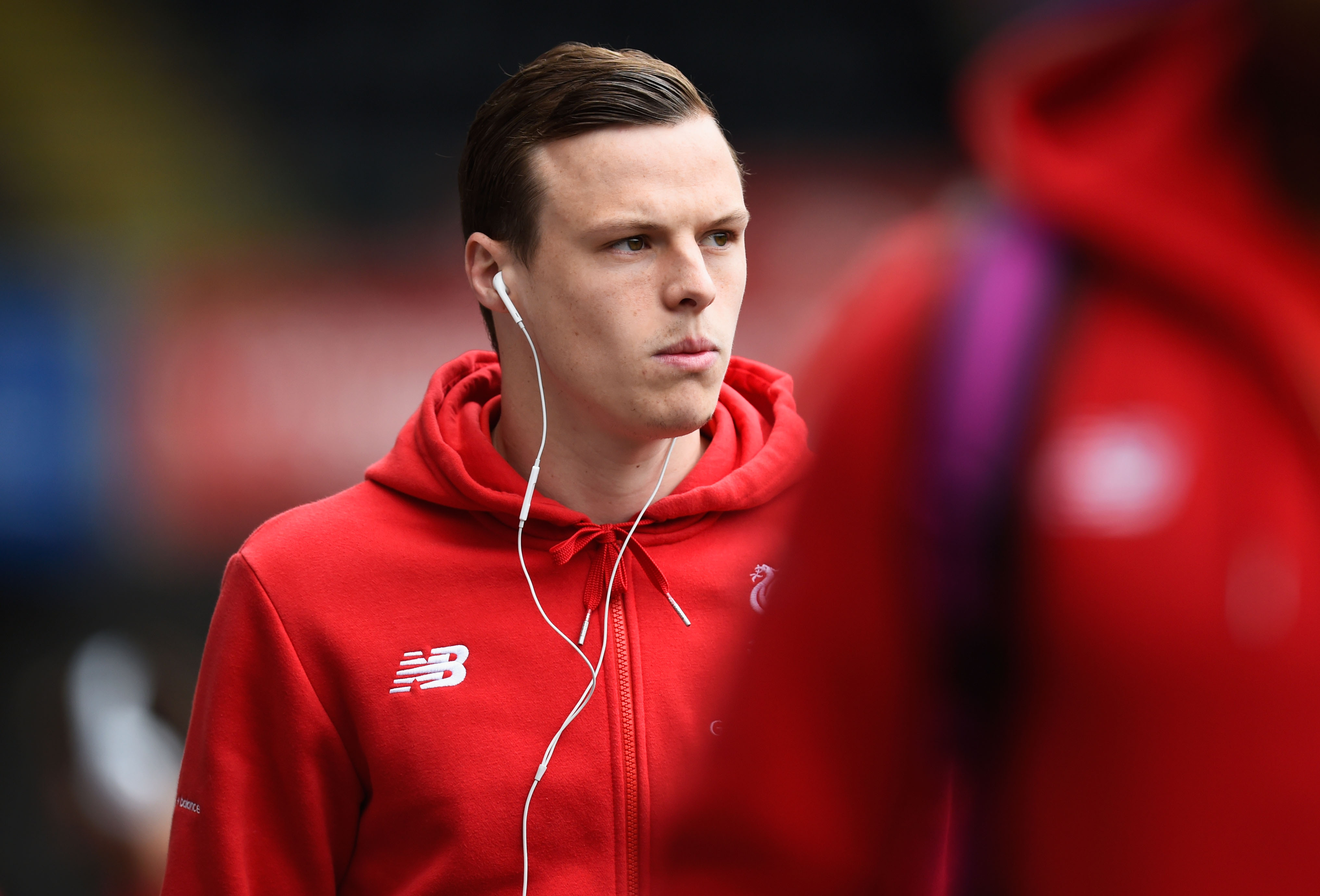 SWANSEA, WALES - MAY 01: Brad Smith of Liverpool arrives for the Barclays Premier League match between Swansea City and Liverpool at The Liberty Stadium on May 1, 2016 in Swansea, Wales.  (Photo by Stu Forster/Getty Images)