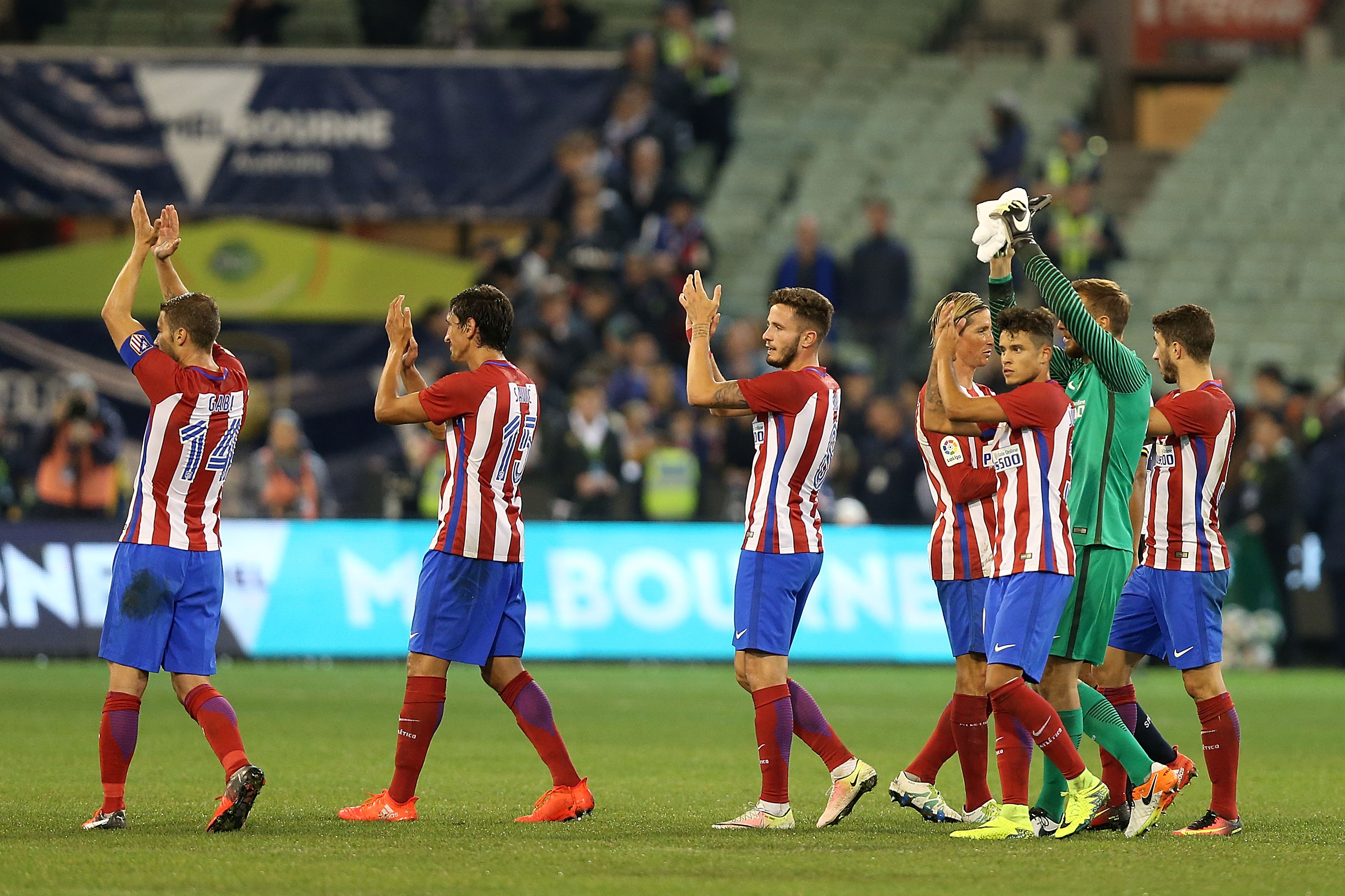 MELBOURNE, AUSTRALIA - JULY 29:  Atletico Madrid thanks the fans after the 2016 International Champions Cup Australia match between Tottenham Hotspur and Atletico de Madrid at Melbourne Cricket Ground on July 29, 2016 in Melbourne, Australia.  (Photo by Jack Thomas/Getty Images)