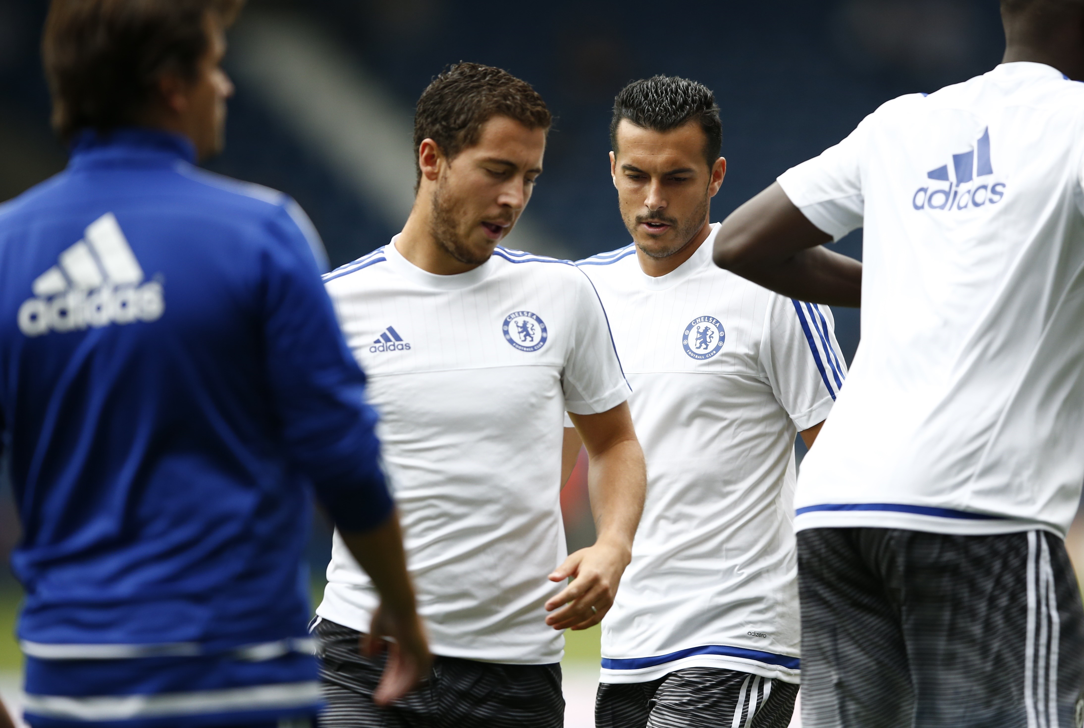 Chelsea's Belgian midfielder Eden Hazard (2nd L) and Chelsea's Spanish midfielder Pedro (2nd R) warm up ahead of the English Premier League football match between West Bromwich Albion and Chelsea at The Hawthorns in West Bromwich, central England on August 23, 2015. AFP PHOTO / JUSTIN TALLIS

RESTRICTED TO EDITORIAL USE. No use with unauthorized audio, video, data, fixture lists, club/league logos or 'live' services. Online in-match use limited to 75 images, no video emulation. No use in betting, games or single club/league/player publications.        (Photo credit should read JUSTIN TALLIS/AFP/Getty Images)