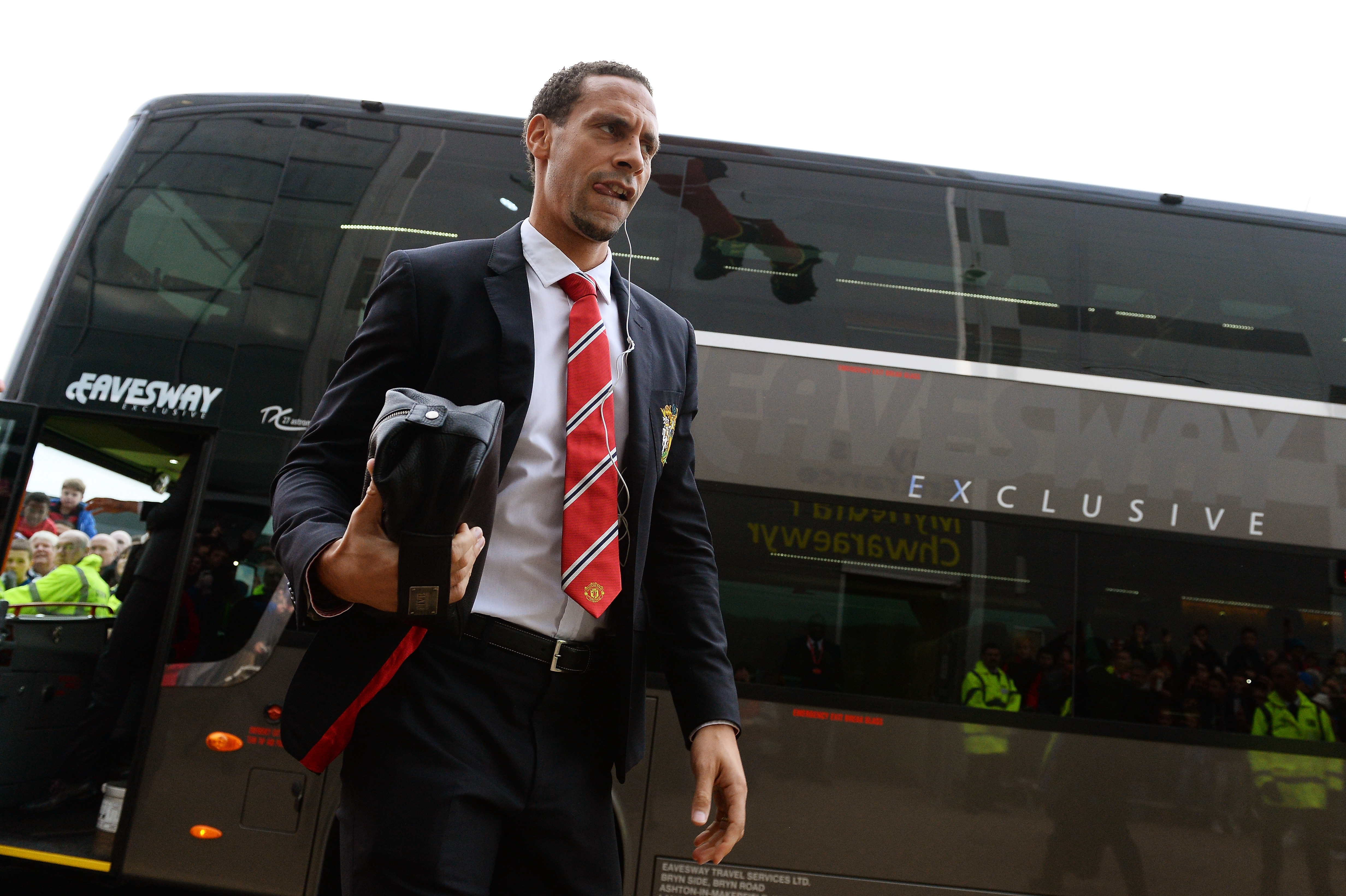 CARDIFF, WALES - NOVEMBER 24:  Rio Ferdinand of Manchester United steps off the team coach prior to kickoff during the Barclays Premier League match between Cardiff City and Manchester United at Cardiff City Stadium on November 24, 2013 in Cardiff, Wales.  (Photo by Mike Hewitt/Getty Images)