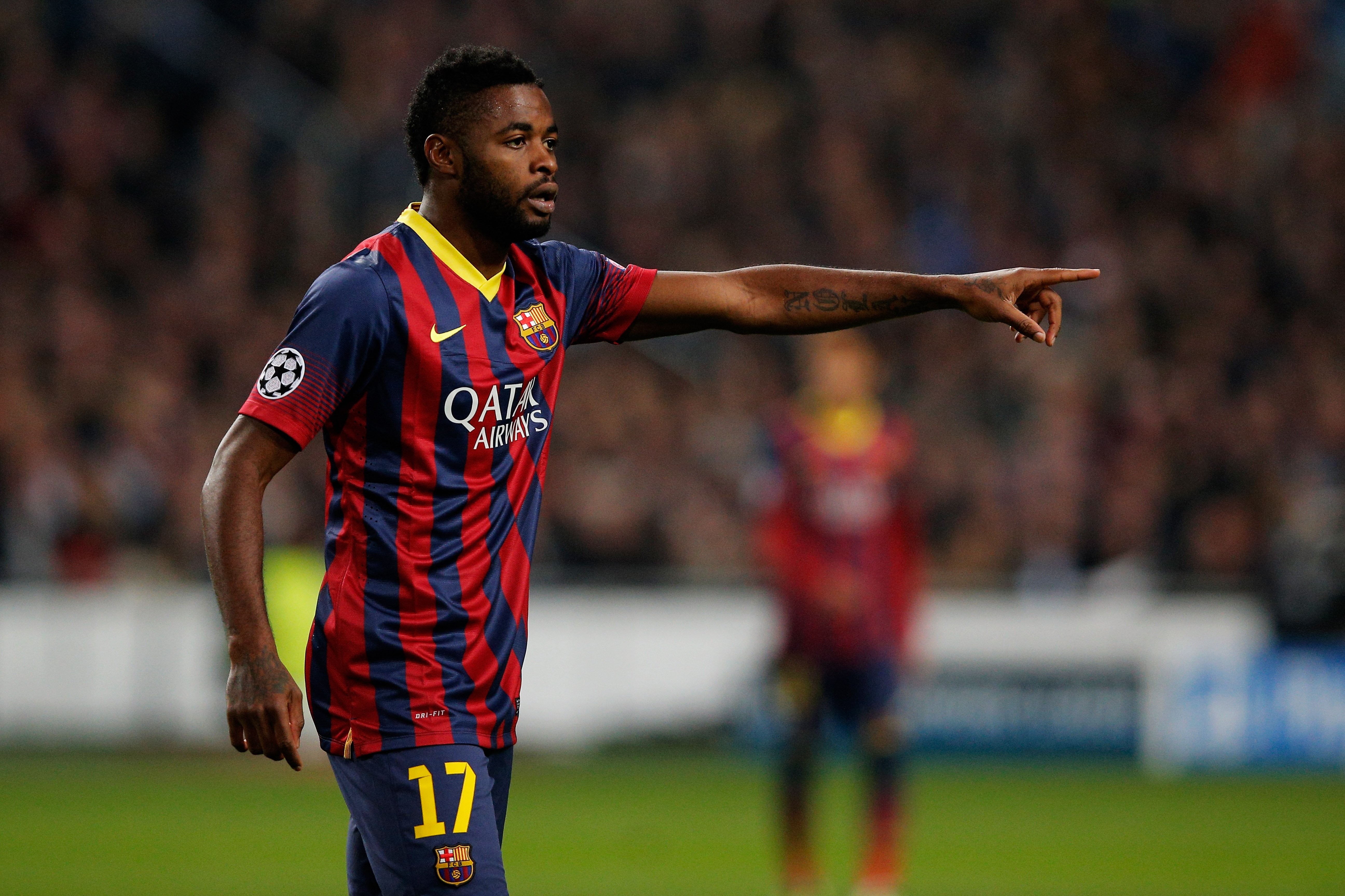 AMSTERDAM, NETHERLANDS - NOVEMBER 26:  Alex Song of Barcelona speaks to a team mate during the UEFA Champions League Group H match between Ajax Amsterdam and FC Barcelona at Amsterdam Arena on November 26, 2013 in Amsterdam, Netherlands.  (Photo by Dean Mouhtaropoulos/Getty Images)