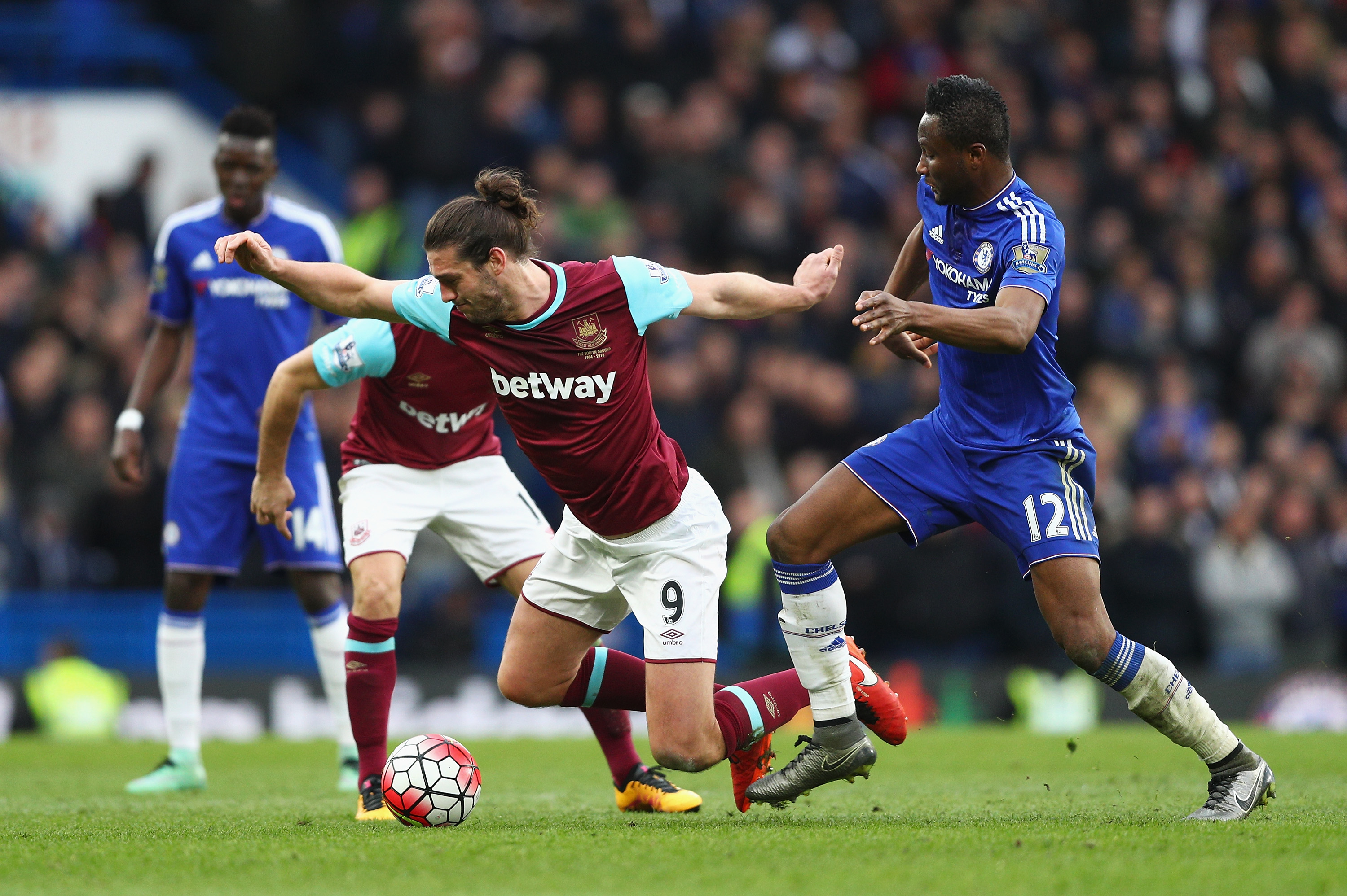 LONDON, ENGLAND - MARCH 19:  Andy Carroll of West Ham United is challenged by John Mikel Obi of Chelsea during the Barclays Premier League match between Chelsea and West Ham United at Stamford Bridge on March 19, 2016 in London, United Kingdom.  (Photo by Paul Gilham/Getty Images)