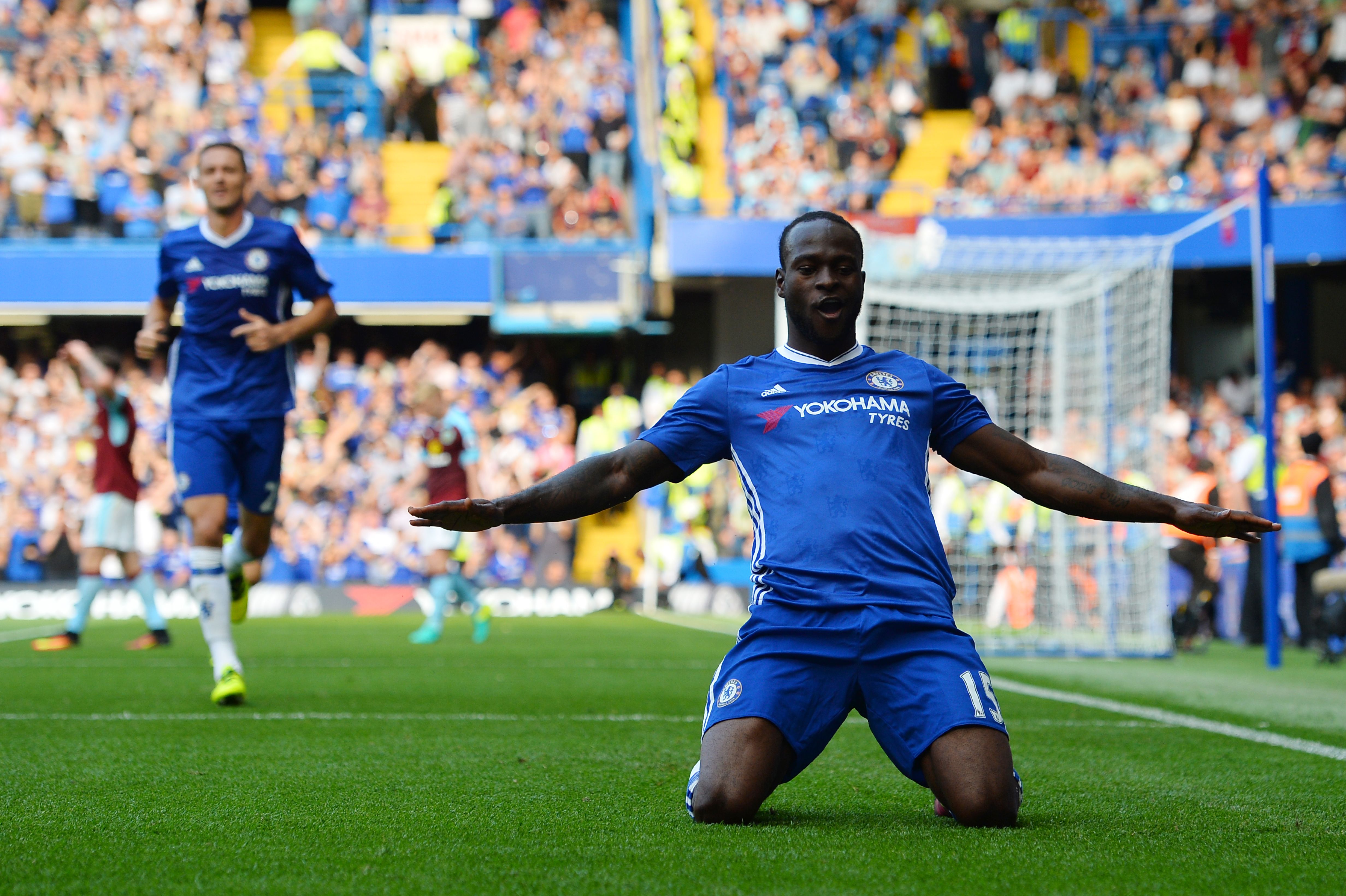 Chelsea's Nigerian midfielder Victor Moses celebrates after scoring during the English Premier League football match between Chelsea and Burnley at Stamford Bridge in London on August 27, 2016. (Photo by Glyn Kirk/AFP/Getty Images)