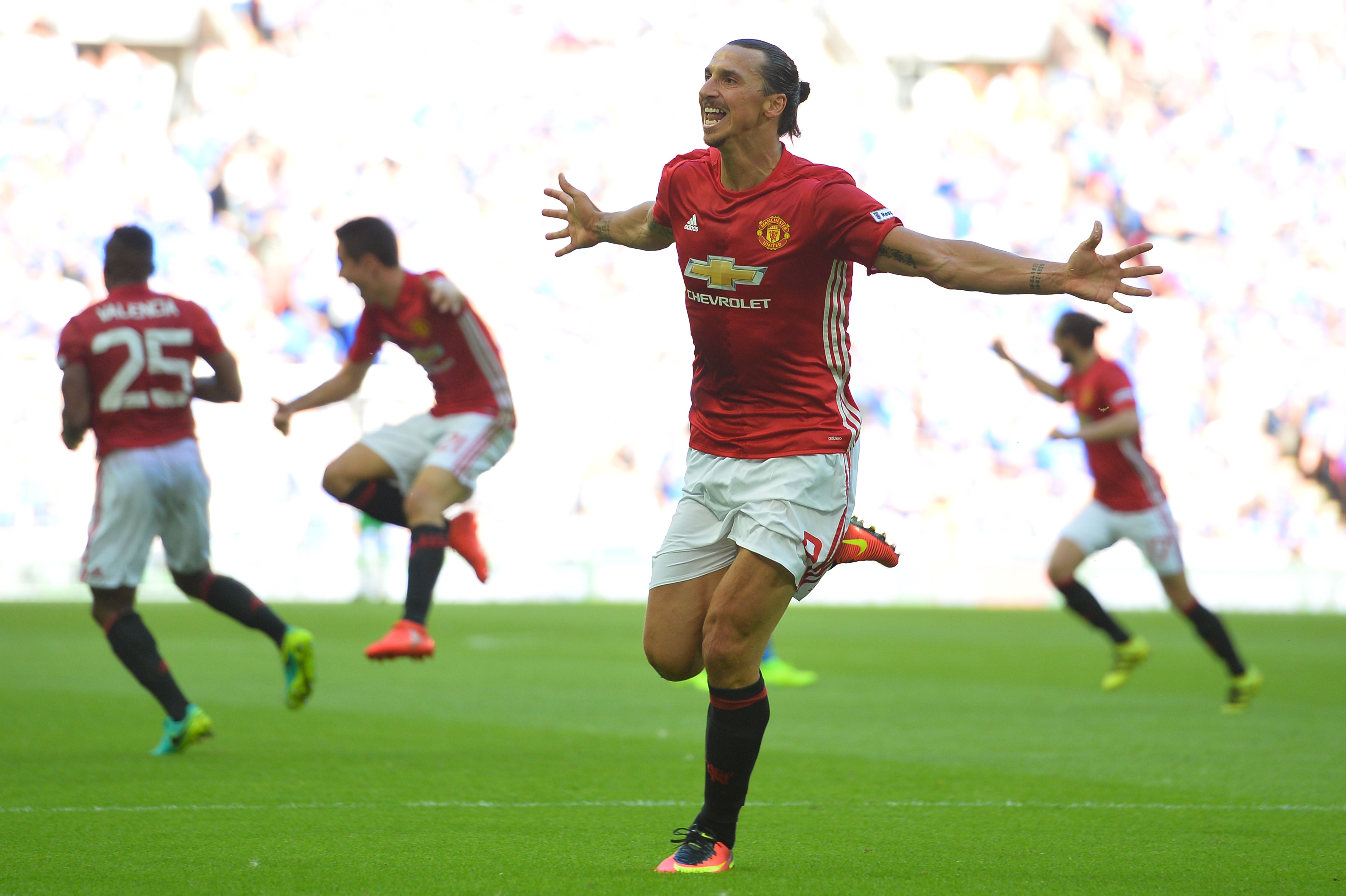 Manchester United's Swedish striker Zlatan Ibrahimovic celebrates scoring their second goal during the FA Community Shield football match between Manchester United and Leicester City at Wembley Stadium in London on August 7, 2016.         (Photo by Glyn Kirk/AFP/Getty Images)