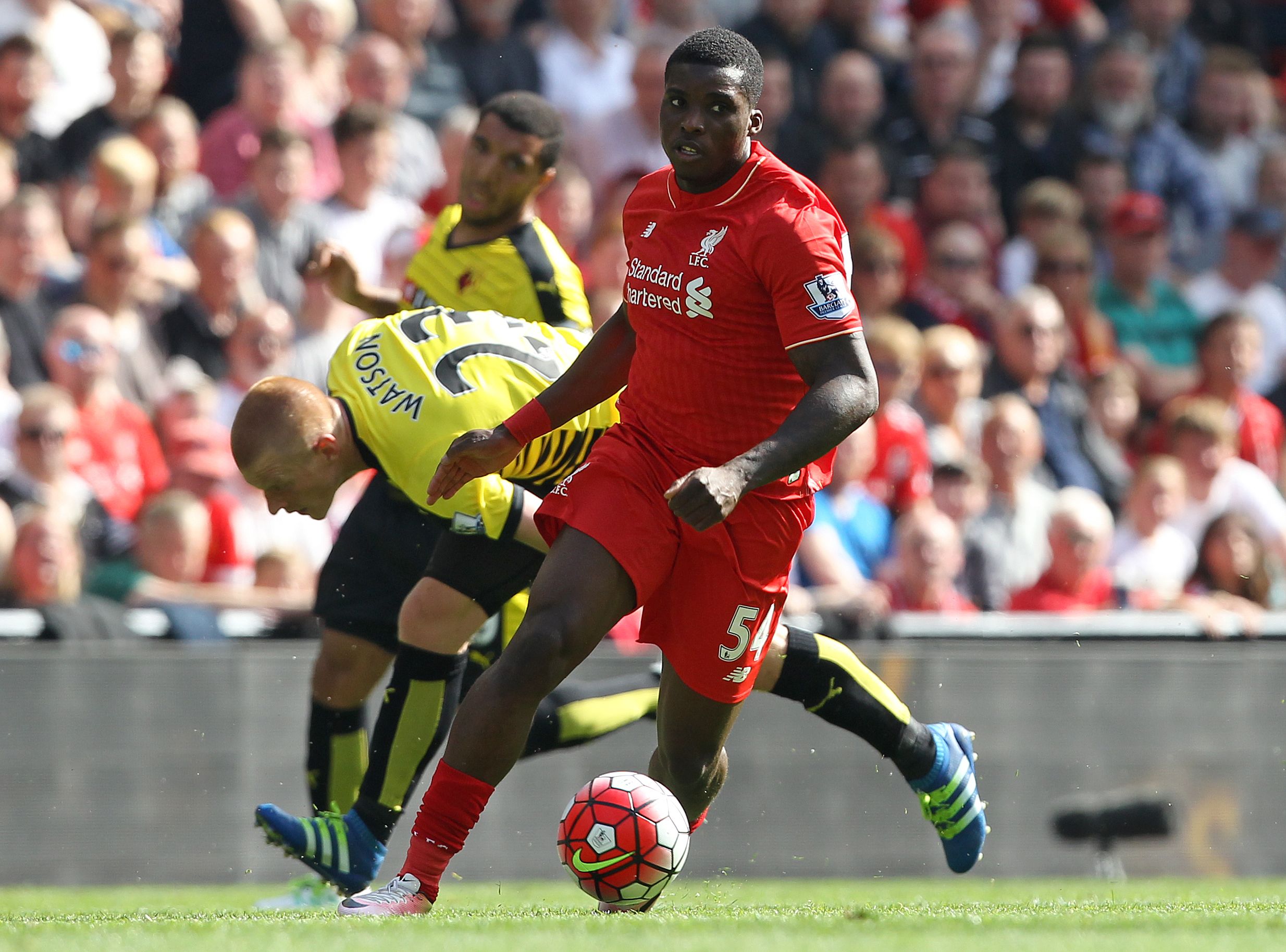 Watford's English midfielder Ben Watson (L) vies with Liverpool's English midfielder Oluwaseyi Ojo during the English Premier League football match between Liverpool and Watford at Anfield in Liverpool, north west England on May 8, 2016. / AFP / LINDSEY PARNABY / RESTRICTED TO EDITORIAL USE. No use with unauthorized audio, video, data, fixture lists, club/league logos or 'live' services. Online in-match use limited to 75 images, no video emulation. No use in betting, games or single club/league/player publications.  /         (Photo credit should read LINDSEY PARNABY/AFP/Getty Images)