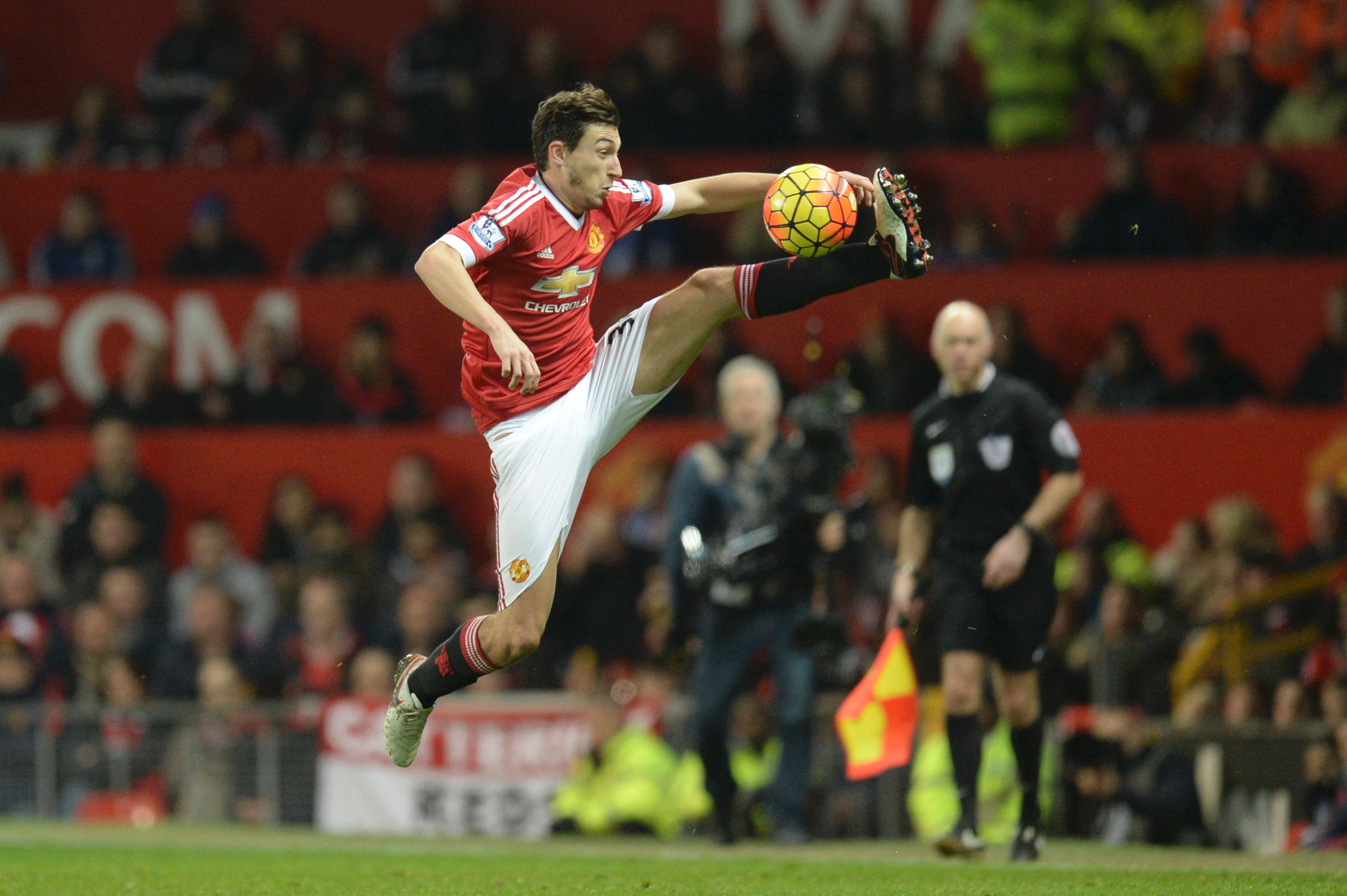 Manchester United's Italian defender Matteo Darmian controls the ball during the English Premier League football match between Manchester United and Chelsea at Old Trafford in Manchester, north west England, on December 28, 2015.
 (Photo by Oli Scarff/AFP/Getty Images)