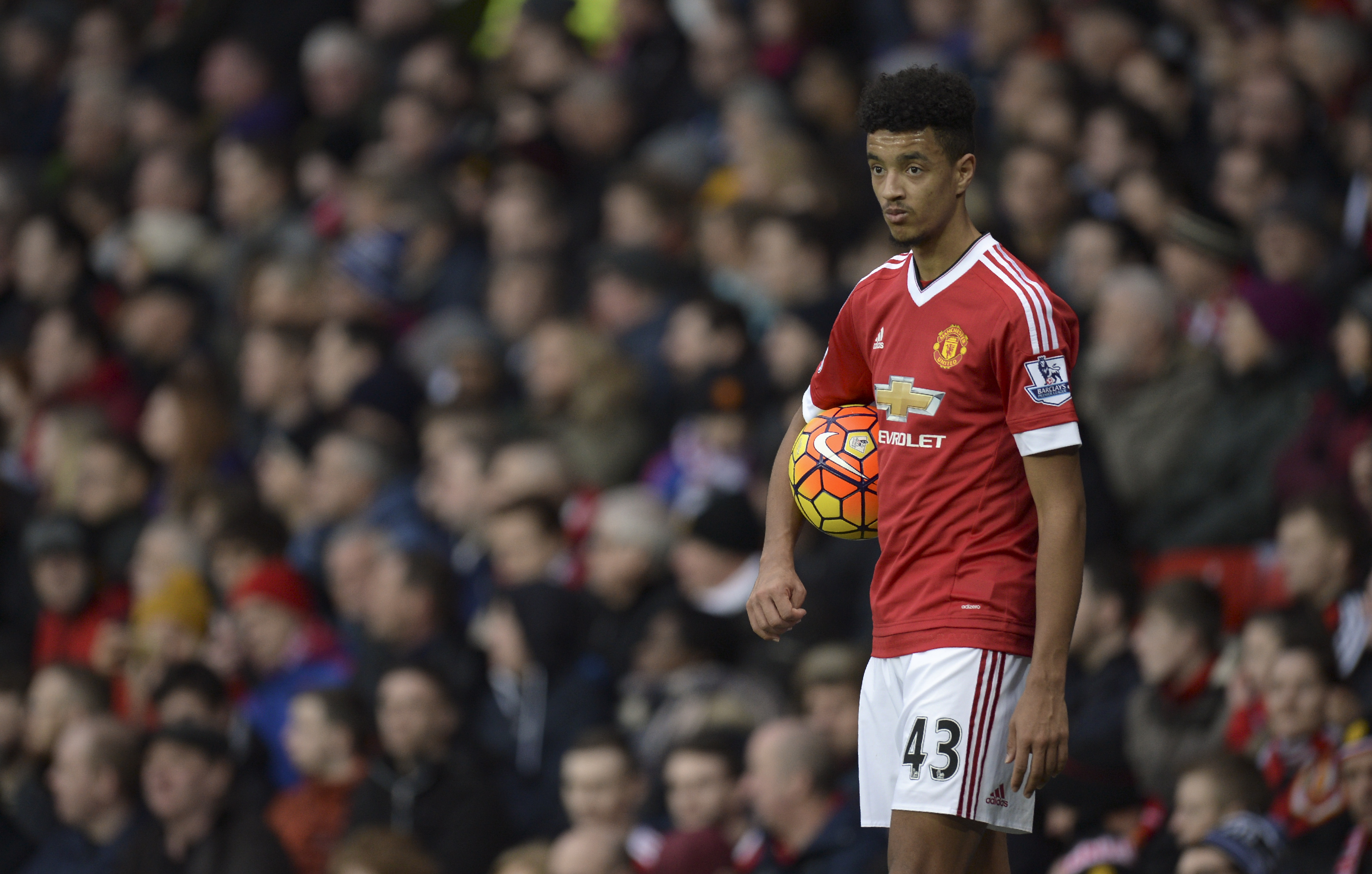 Manchester United's English defender Cameron Borthwick-Jackson prepares to take a throw in during the English Premier League football match between Manchester United and Southampton at Old Trafford in Manchester, north west England, on January 23, 2016. AFP PHOTO / OLI SCARFF

RESTRICTED TO EDITORIAL USE. No use with unauthorized audio, video, data, fixture lists, club/league logos or 'live' services. Online in-match use limited to 75 images, no video emulation. No use in betting, games or single club/league/player publications. / AFP / OLI SCARFF        (Photo credit should read OLI SCARFF/AFP/Getty Images)