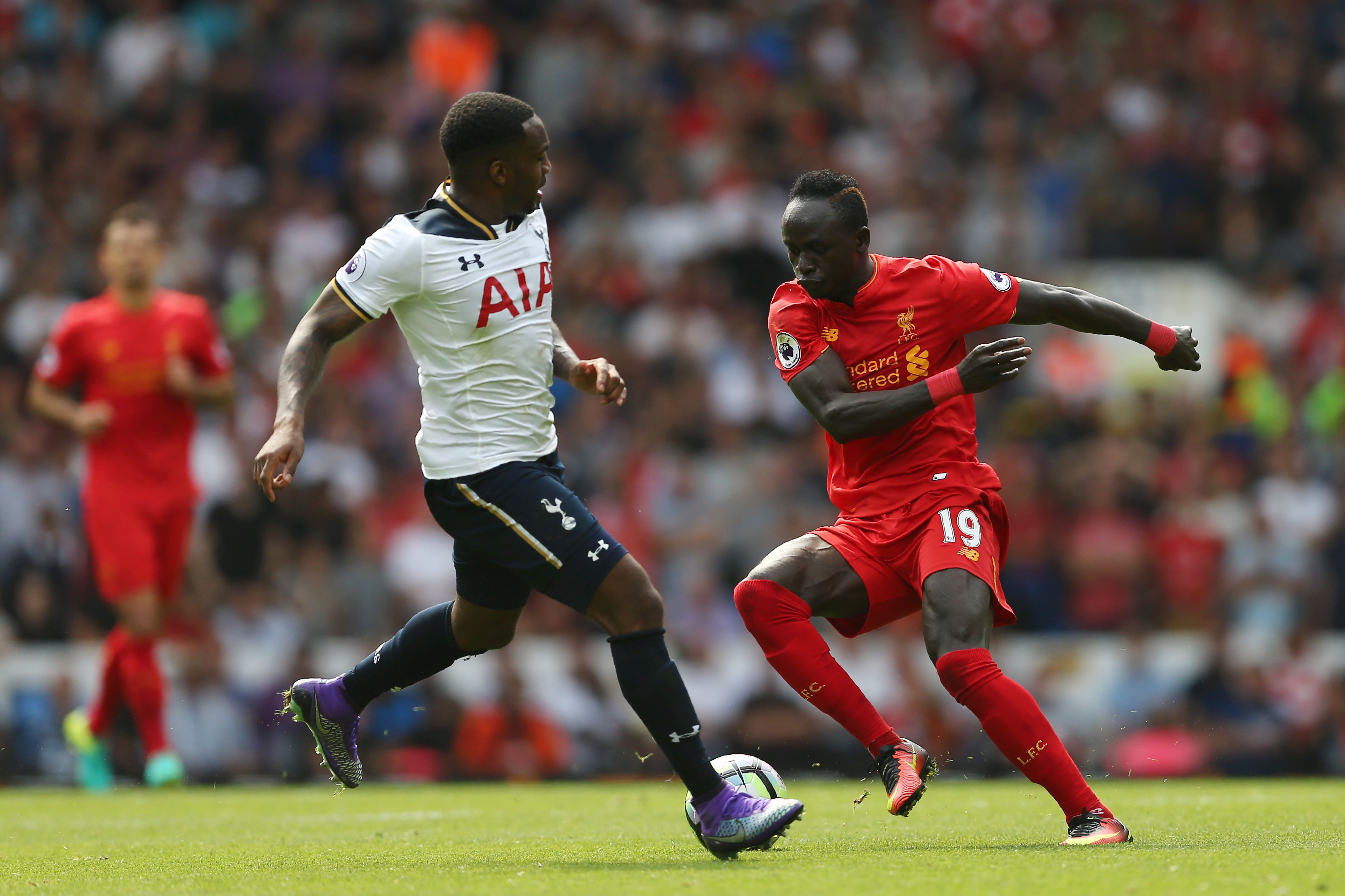 Tottenham Hotspur's English defender Danny Rose (L) vies with Liverpool's Senegalese midfielder Sadio Mane during the English Premier League football match between Tottenham Hotspur and Liverpool at White Hart Lane in London, on August 27, 2016. / AFP / JUSTIN TALLIS / RESTRICTED TO EDITORIAL USE. No use with unauthorized audio, video, data, fixture lists, club/league logos or 'live' services. Online in-match use limited to 75 images, no video emulation. No use in betting, games or single club/league/player publications.  /         (Photo credit should read JUSTIN TALLIS/AFP/Getty Images)