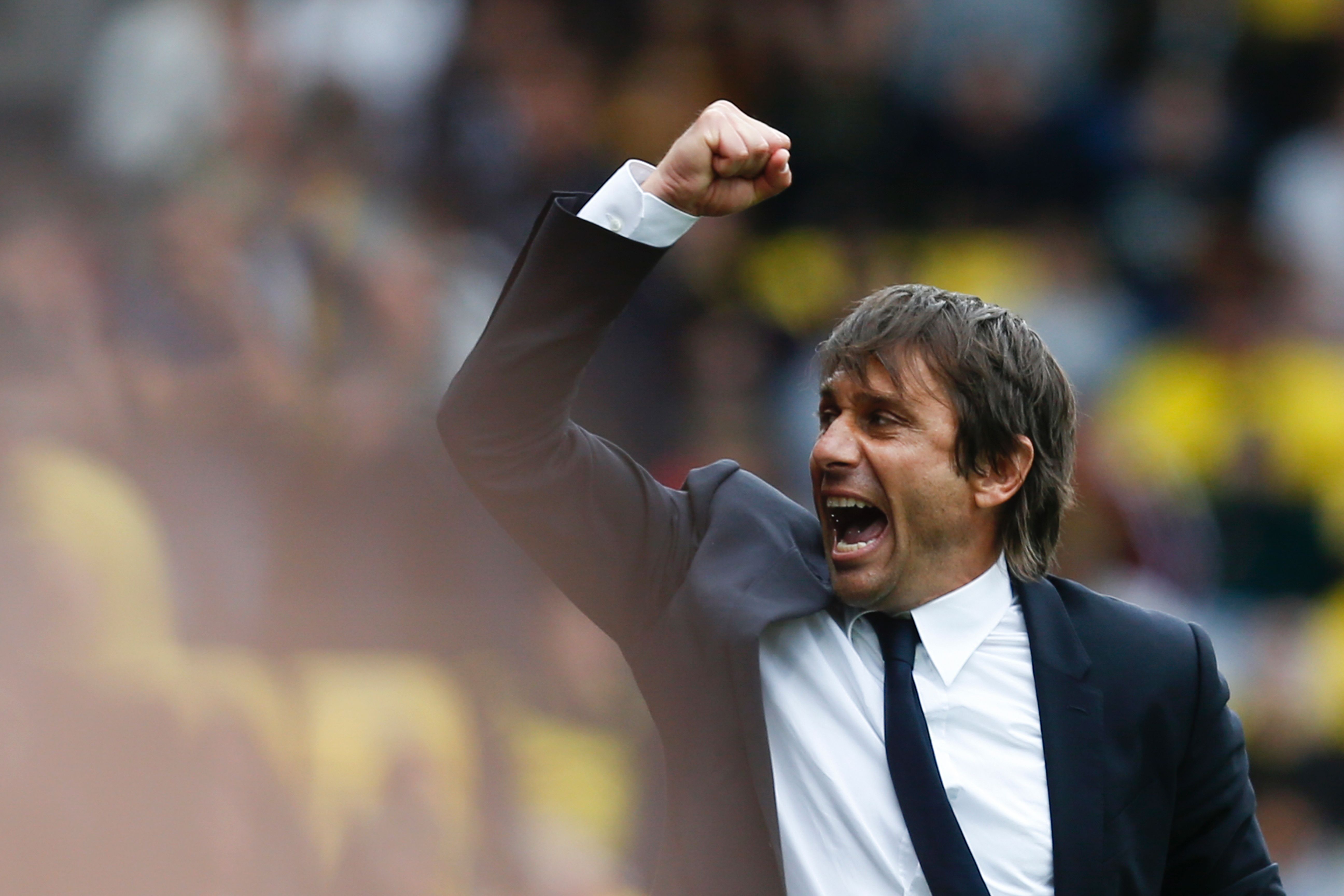 Chelsea's Italian head coach Antonio Conte reacts at the final whistle on the touchline during the English Premier League football match between Watford and Chelsea at Vicarage Road Stadium in Watford, north of London on August 20, 2016.  (Photo Credit: Ian Kington/AFP/Getty Images)