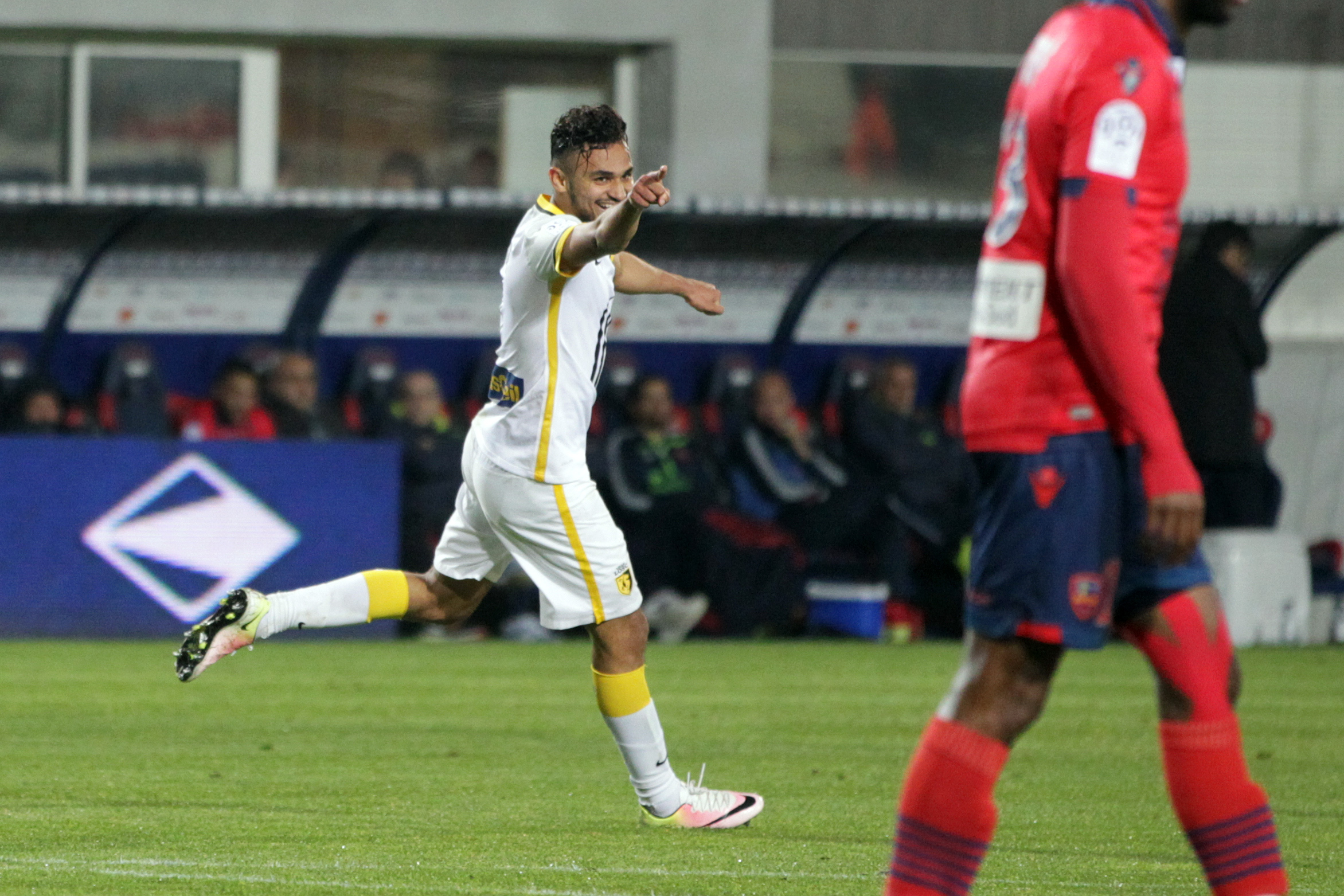 Lille's French midfielder Sofiane Boufal (C) celebrates after scoring a goal during the French L1 football match Gazelec Ajaccio (GFCA) against Lille (LOSC) on April 16, 2016, at the Ange Casanova stadium in Ajaccio, on the French Mediterranean island of Corsica. AFP PHOTO / PASCAL POCHARD-CASABIANCA / AFP / PASCAL POCHARD-CASABIANCA        (Photo credit should read PASCAL POCHARD-CASABIANCA/AFP/Getty Images)