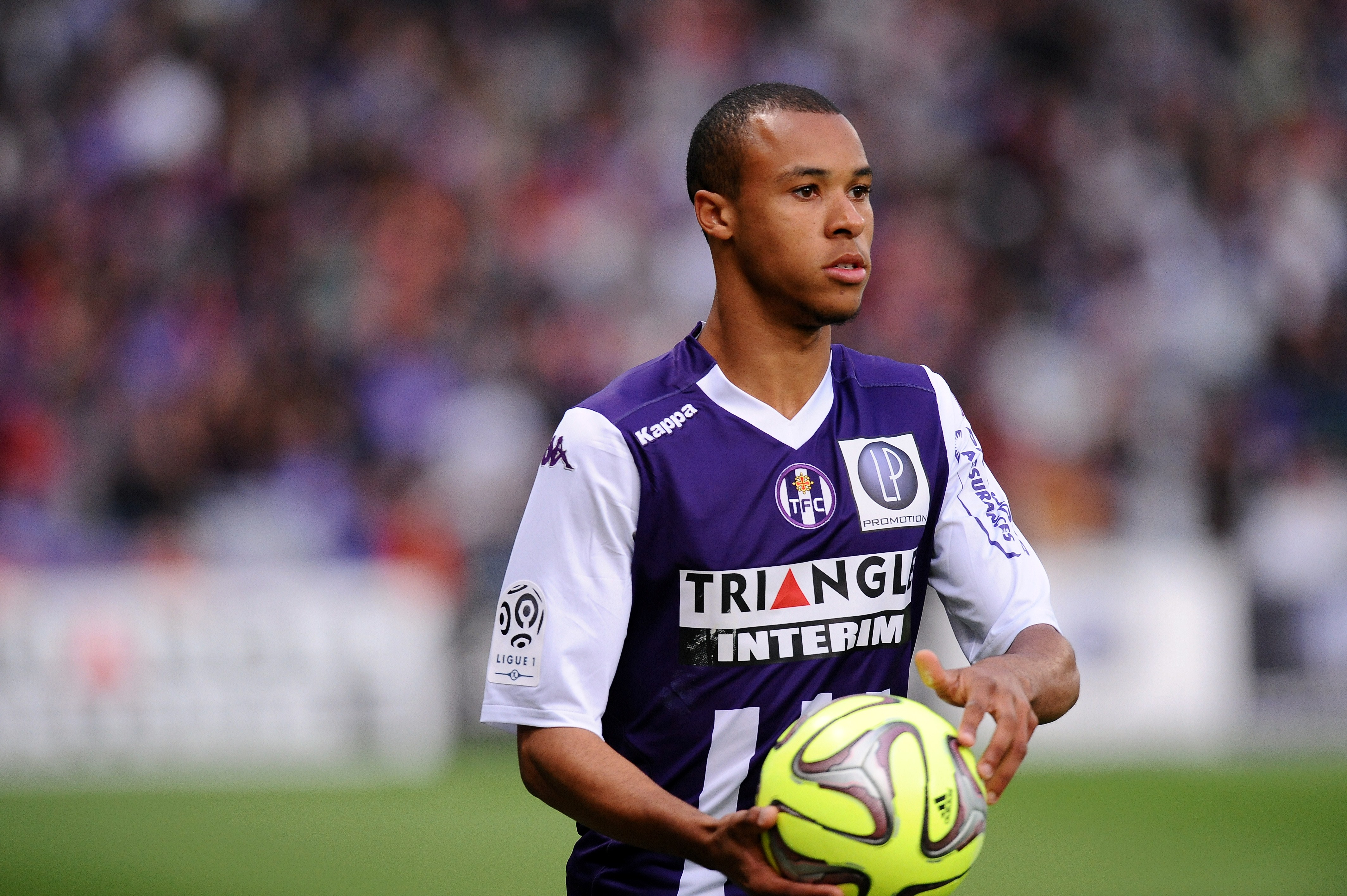 Toulouse's defender Marcel Tisserand holds the ball the French L1 football match Toulouse vs Guigamp on December 20, 2015 at the Municipal Stadium in Toulouse.AFP PHOTO/ REMY GABALDA        (Photo credit should read REMY GABALDA/AFP/Getty Images)