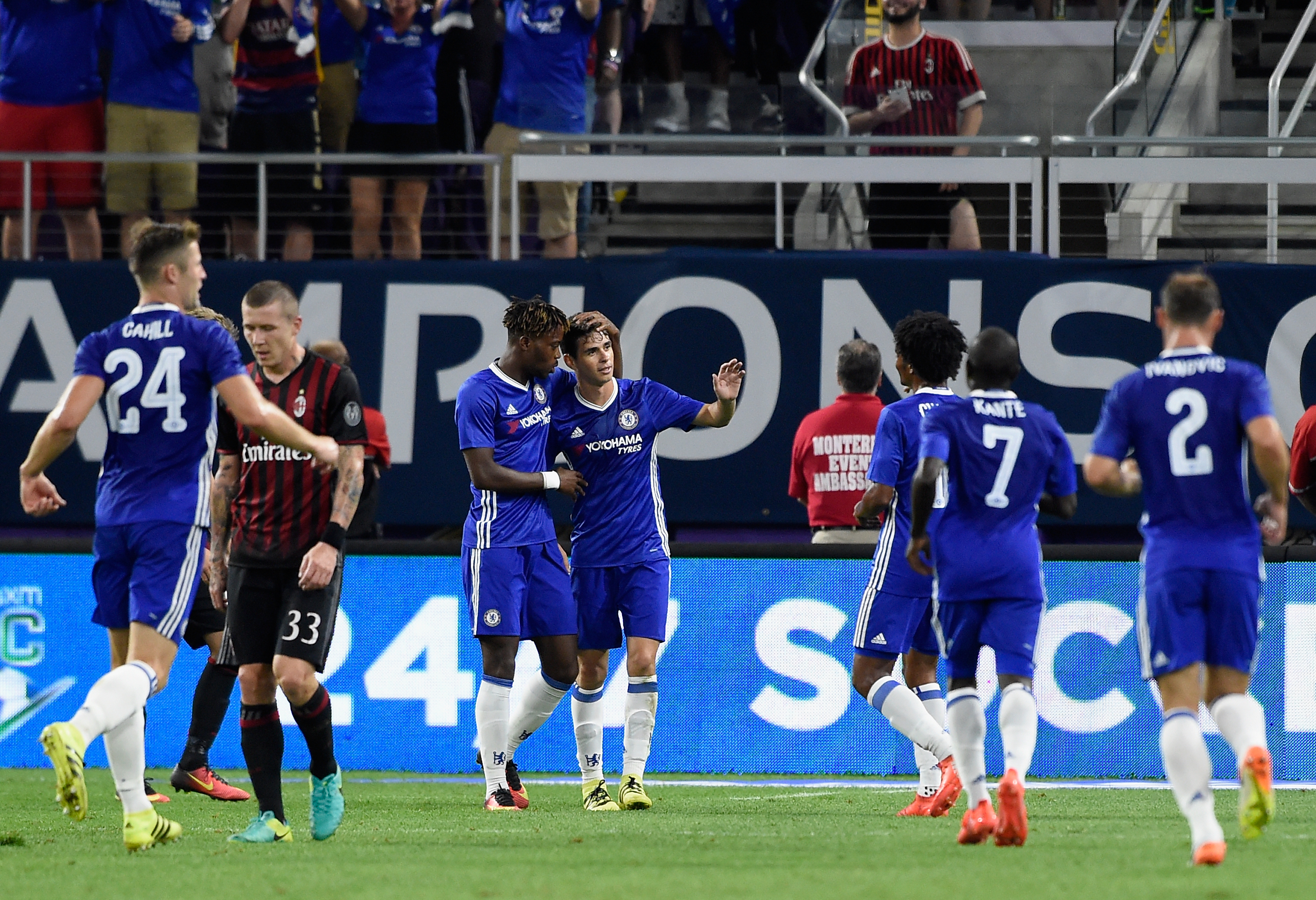 MINNEAPOLIS, MN - AUGUST 3: Chelsea celebrates a goal by Oscar #8 as Juraj Kucka #33 of AC Milan looks on during the second half of the International Champions Cup match on August 3, 2016 at U.S. Bank Stadium in Minneapolis, Minnesota. Chelsea defeat AC Milan 3-1. (Photo by Hannah Foslien/Getty Images)