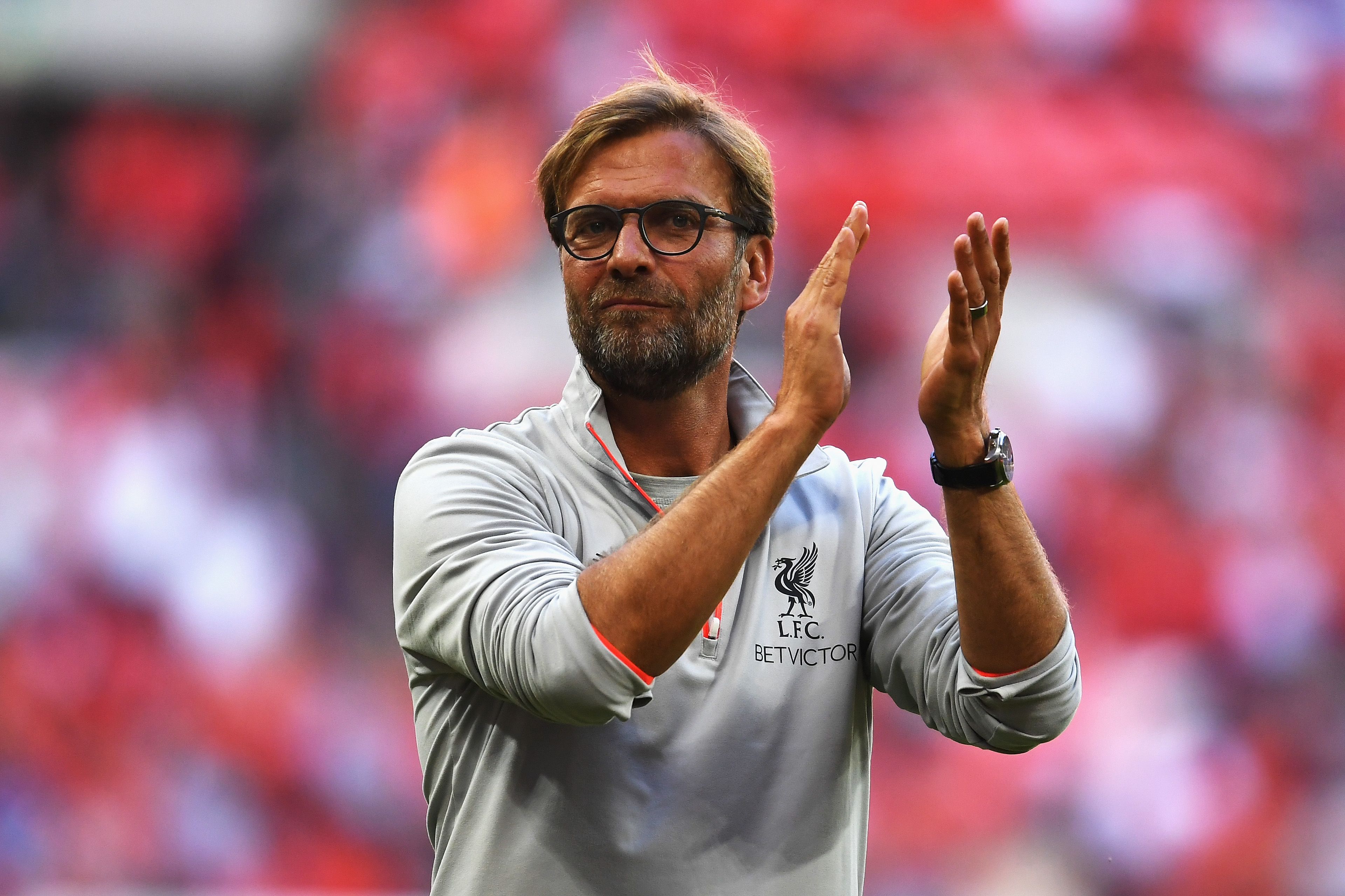 LONDON, ENGLAND - AUGUST 06:  Jurgen Klopp, Manager of Liverpool celebrates victory after the International Champions Cup match between Liverpool and Barcelona at Wembley Stadium on August 6, 2016 in London, England.  (Photo by Mike Hewitt/Getty Images)