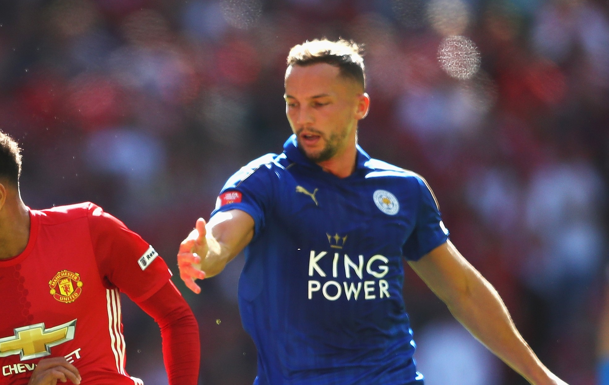 LONDON, ENGLAND - AUGUST 07: Jesse Lingard of Manchester United takes the ball past Wes Morgan of Leicester City and Daniel Drinkwater of Leicester City during The FA Community Shield match between Leicester City and Manchester United at Wembley Stadium on August 7, 2016 in London, England.  (Photo by Michael Steele/Getty Images)