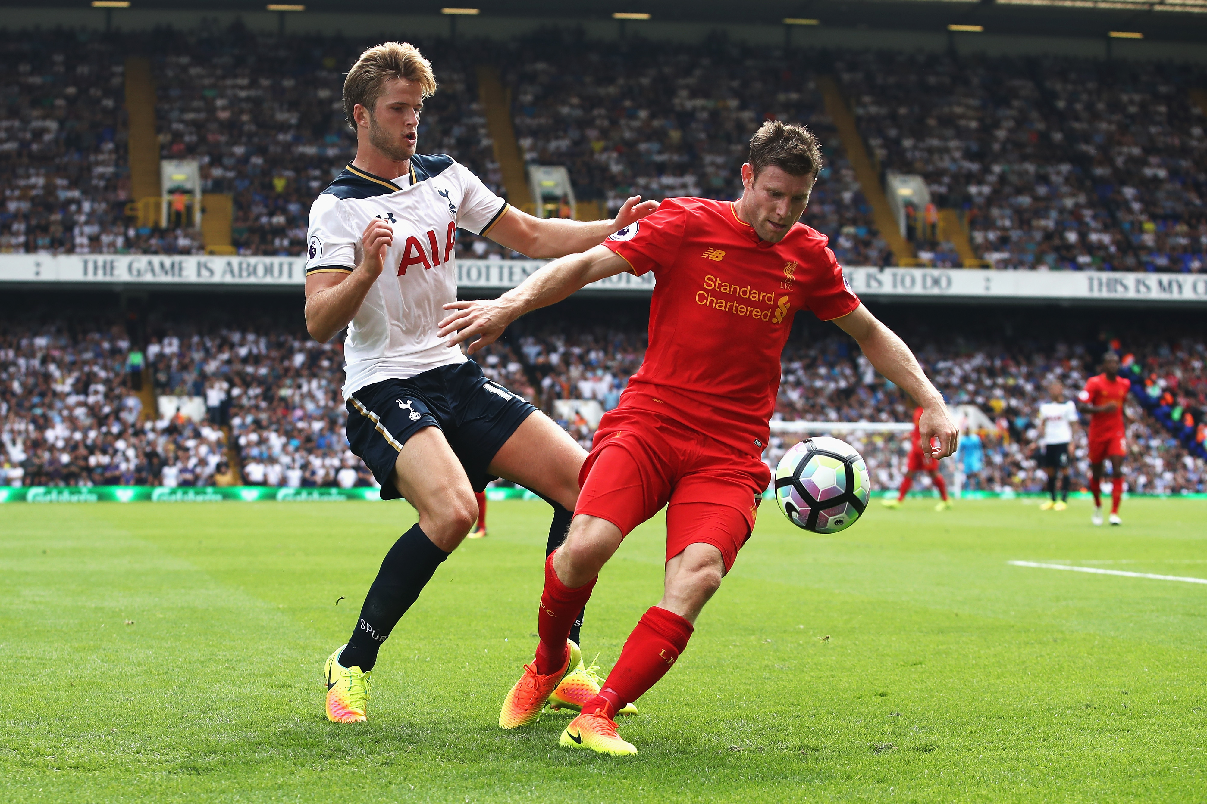 LONDON, ENGLAND - AUGUST 27:  Eric Dier of Tottenham Hotspur (L) and James Milner of Liverpool (R) battle for possession during the Premier League match between Tottenham Hotspur and Liverpool at White Hart Lane on August 27, 2016 in London, England.  (Photo by Julian Finney/Getty Images)