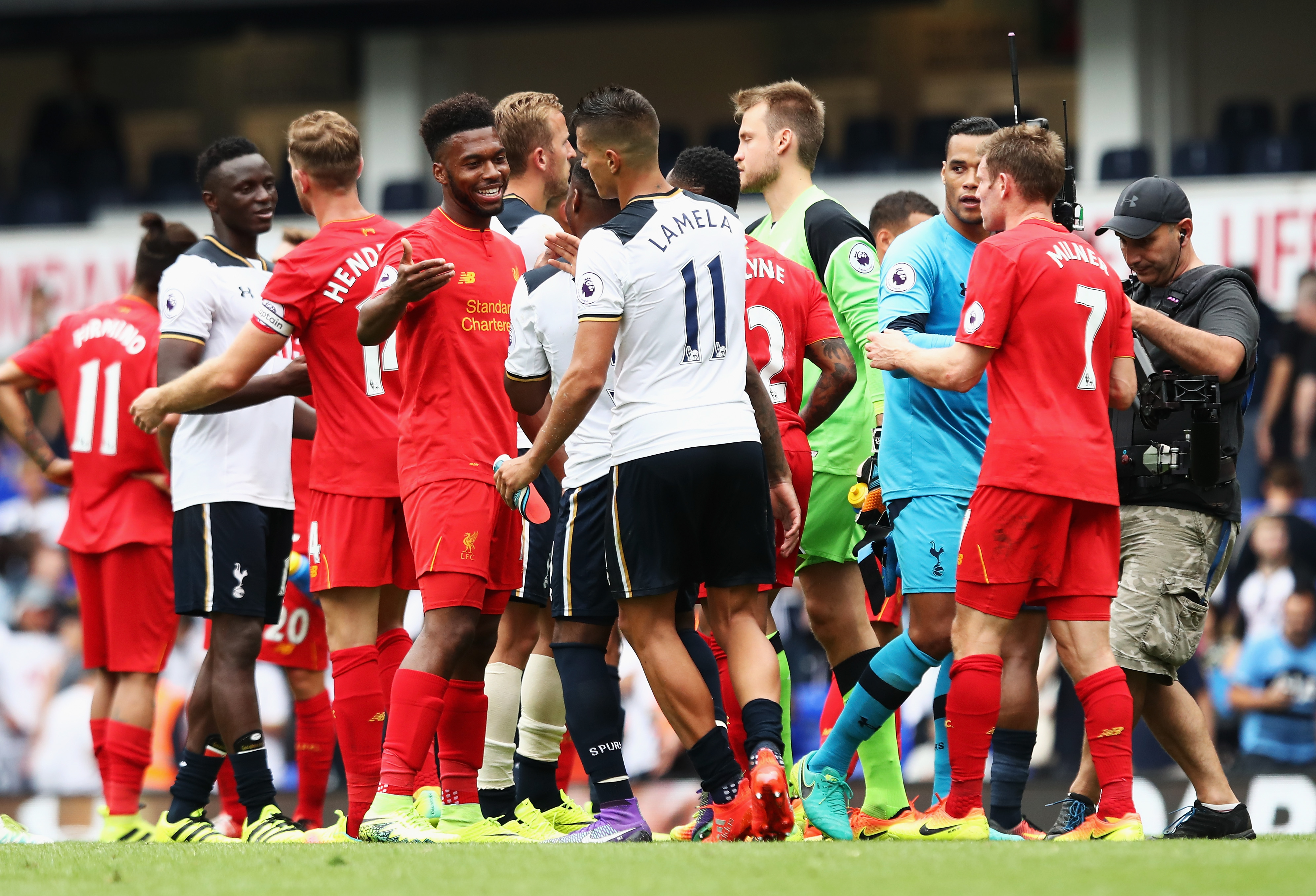 LONDON, ENGLAND - AUGUST 27: Tottenham Hotspur and Liverpool players exchange words after the final whistle during the Premier League match between Tottenham Hotspur and Liverpool at White Hart Lane on August 27, 2016 in London, England.  (Photo by Julian Finney/Getty Images)