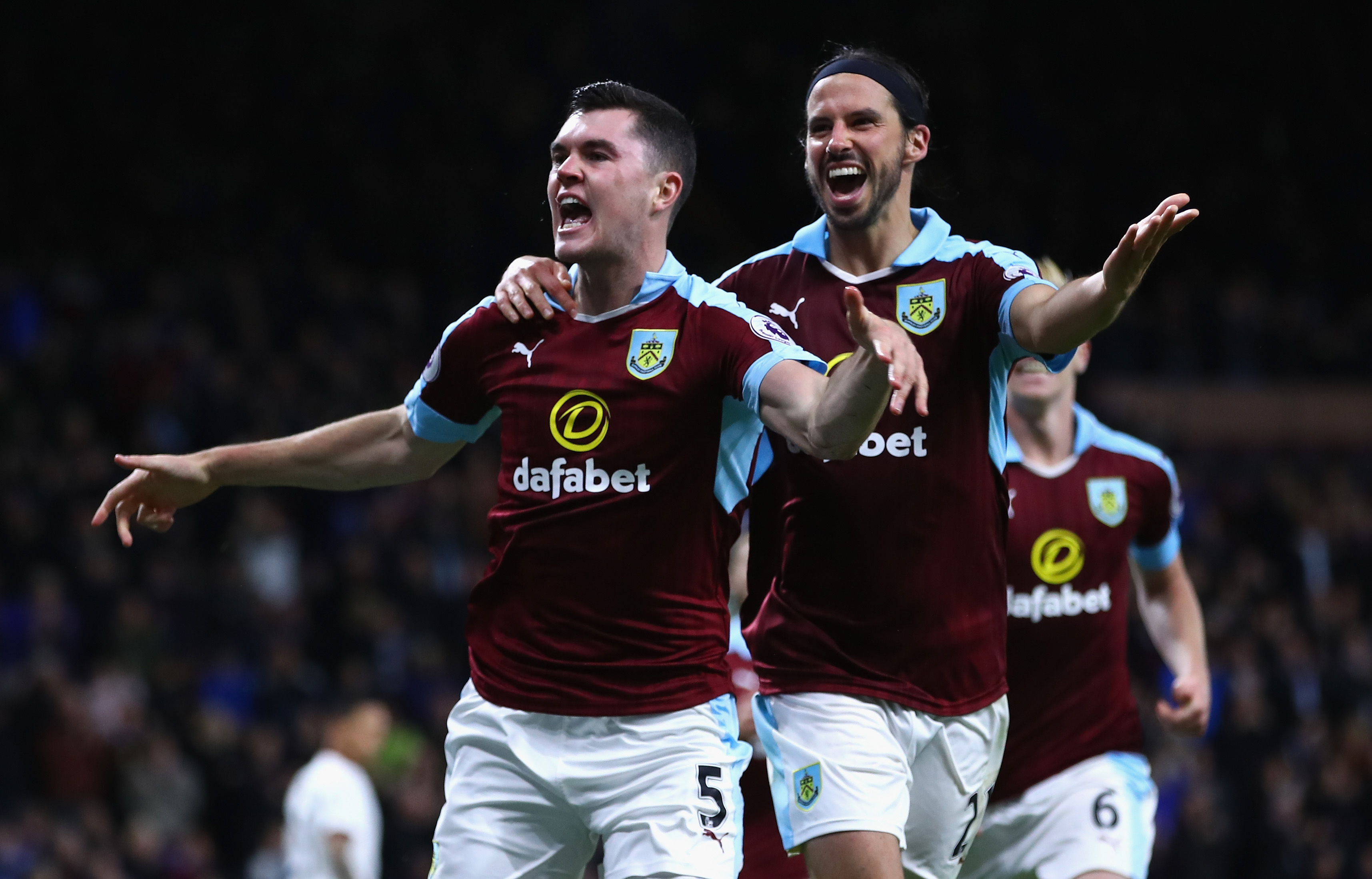 BURNLEY, ENGLAND - SEPTEMBER 26:  Michael Keane of Burnley (L) celebrates scoring his sides second goal with team George Boyd of Burnley (R) during the Premier League match between Burnley and Watford at Turf Moor on September 26, 2016 in Burnley, England.  (Photo by Clive Brunskill/Getty Images)