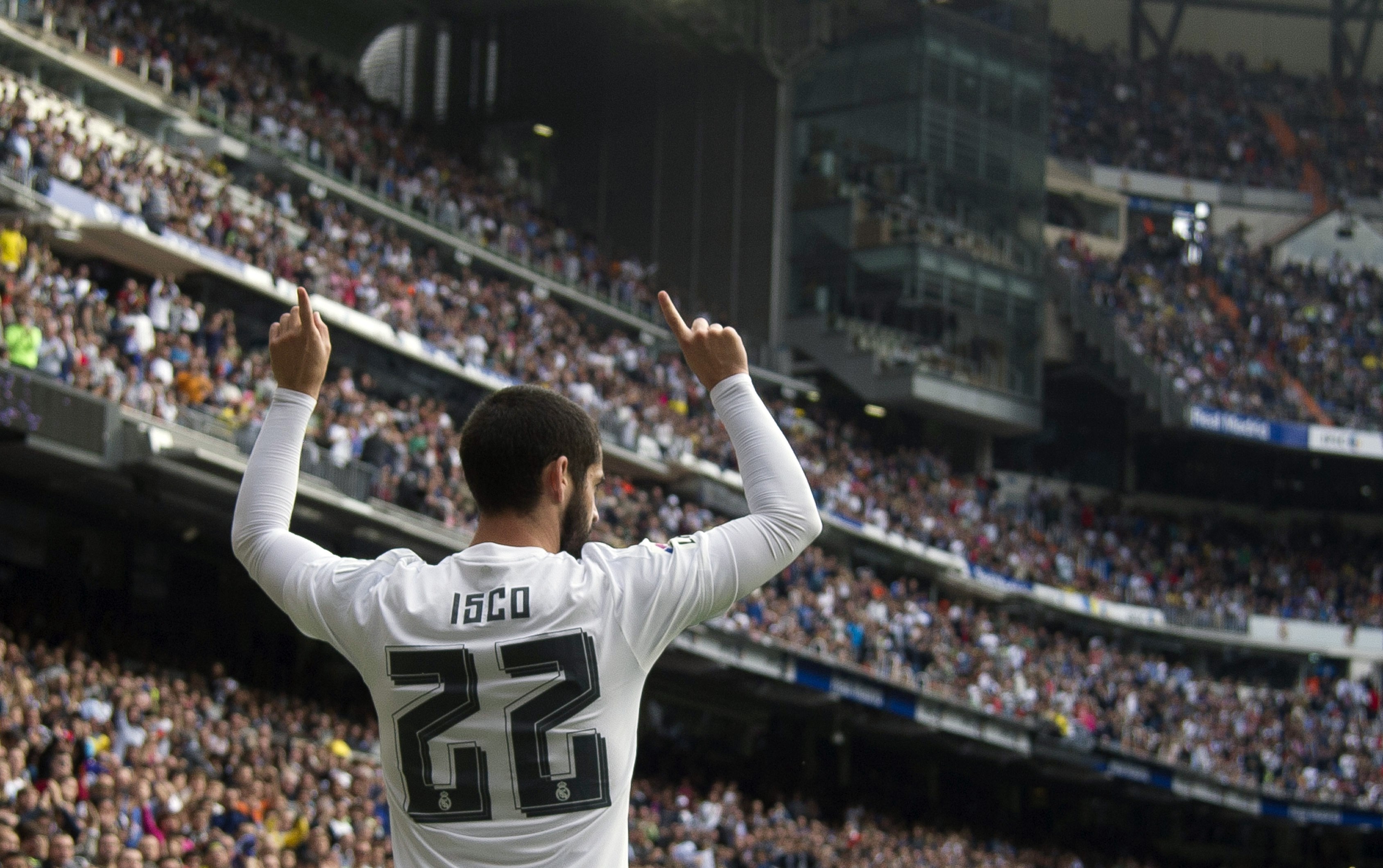 Real Madrid's midfielder Isco celebrates his goal during the Spanish league football match Real Madrid CF vs UD Las Palmas at the Santiago Bernabeu stadium in Madrid on October 31, 2015.(Photo by Curto de la Torre/AFP/Getty Images)