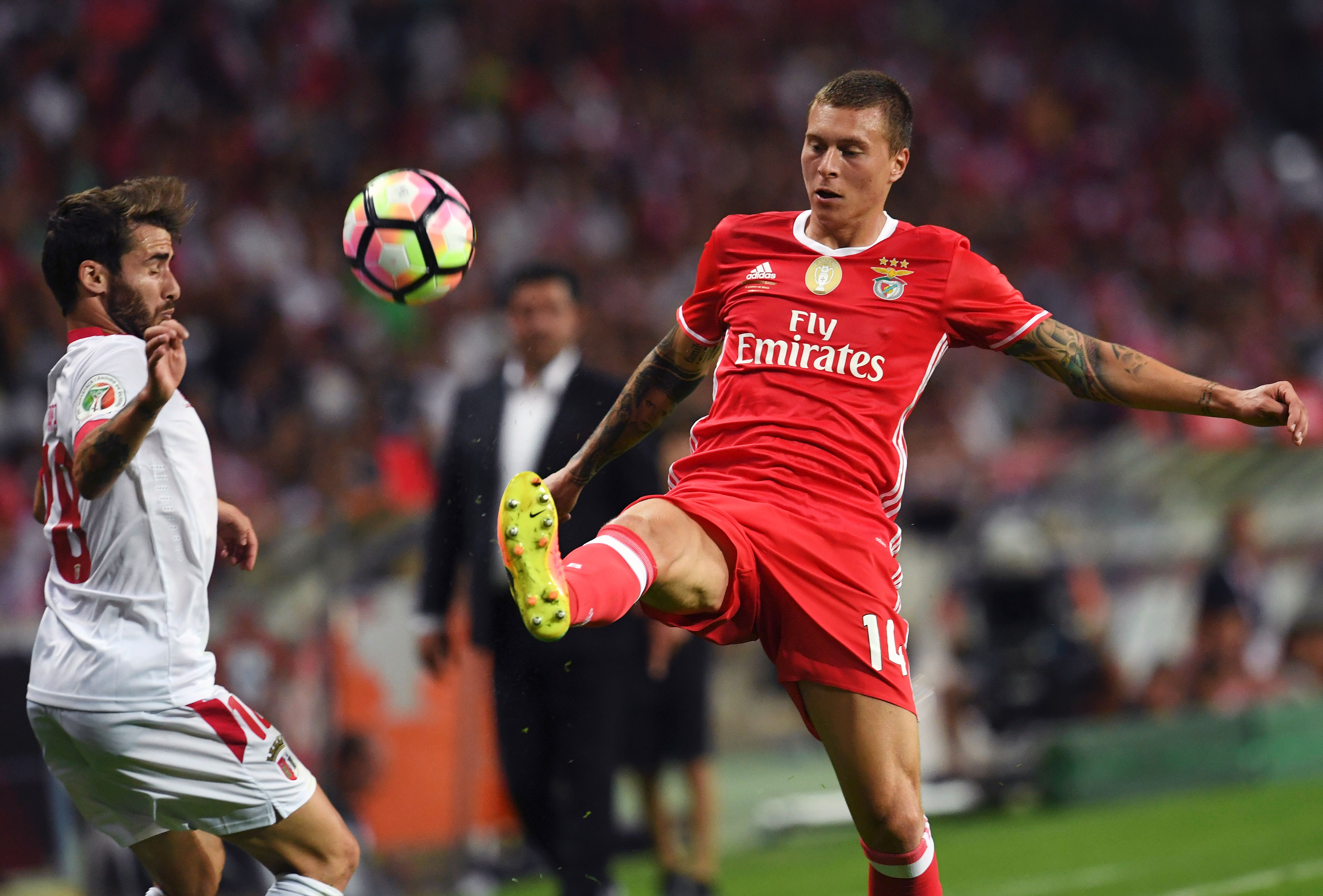 Sporting Braga's forward Rafa (L) vies with Benfica's Swedish defender Victor Nilsson-Lindelof during the Portuguese league football match SL Benfica vs SC Braga at the Municipal stadium in Aveiro on August 7, 2016. / AFP / FRANCISCO LEONG        (Photo credit should read FRANCISCO LEONG/AFP/Getty Images)