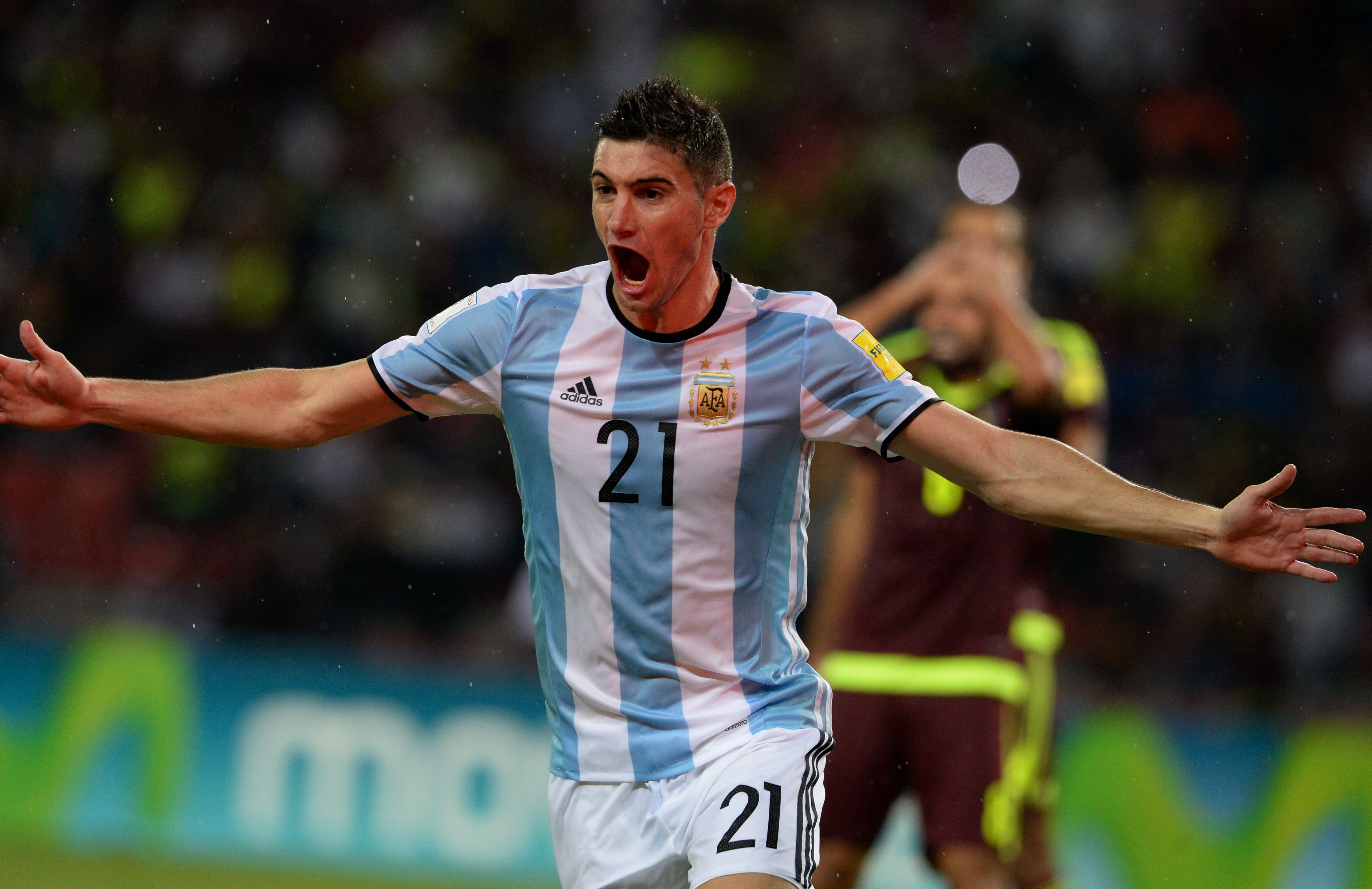 Argentina's Lucas Alario celebrates after a teammate scored against Venezuela during their Russia 2018 World Cup football qualifier match in Merida, Venezuela, on September 6, 2016. / AFP / FEDERICO PARRA        (Photo credit should read FEDERICO PARRA/AFP/Getty Images)
