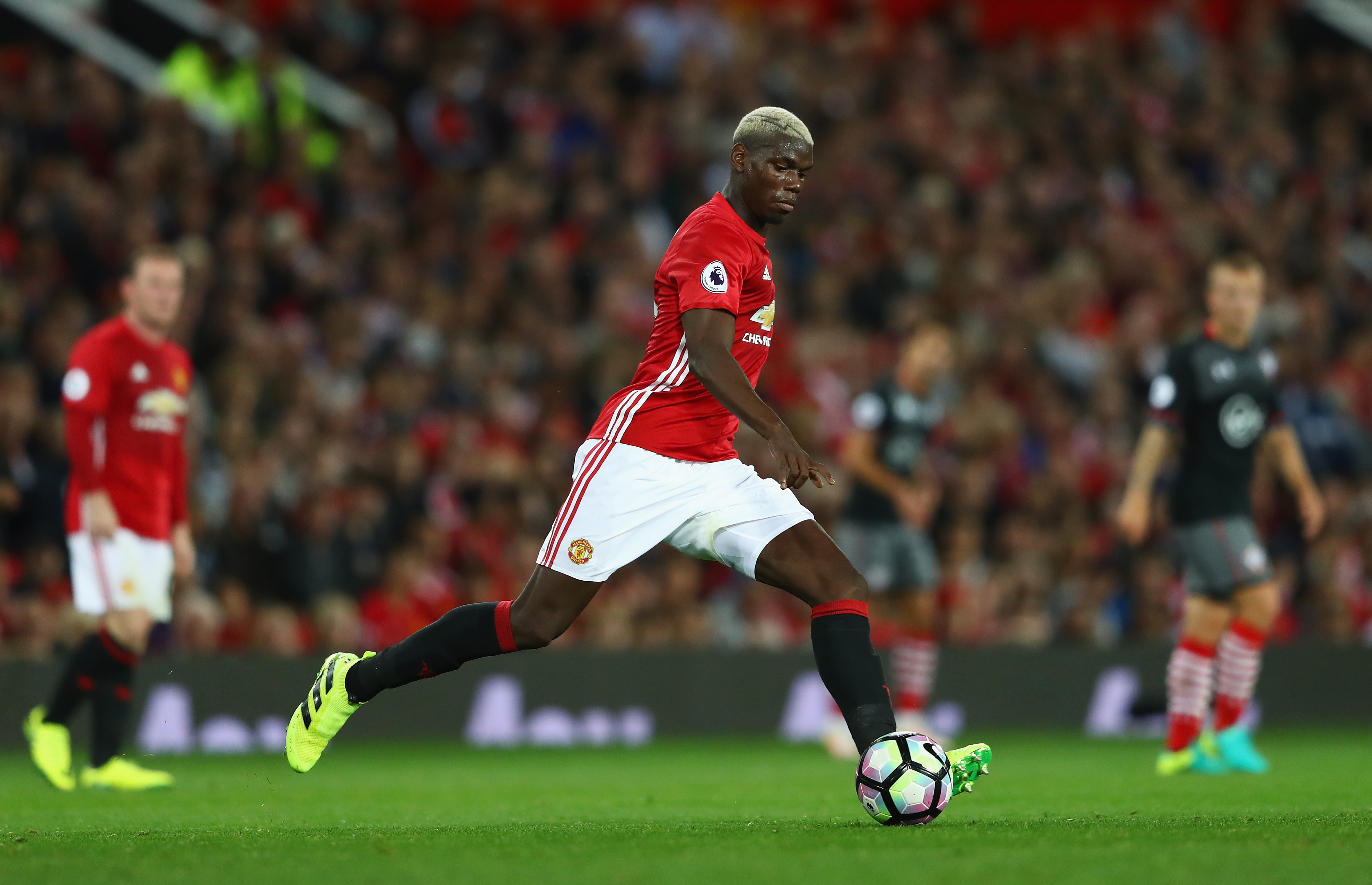 MANCHESTER, ENGLAND - AUGUST 19:  Paul Pogba of Manchester United in action during the Premier League match between Manchester United and Southampton at Old Trafford on August 19, 2016 in Manchester, England.  (Photo by Michael Steele/Getty Images)