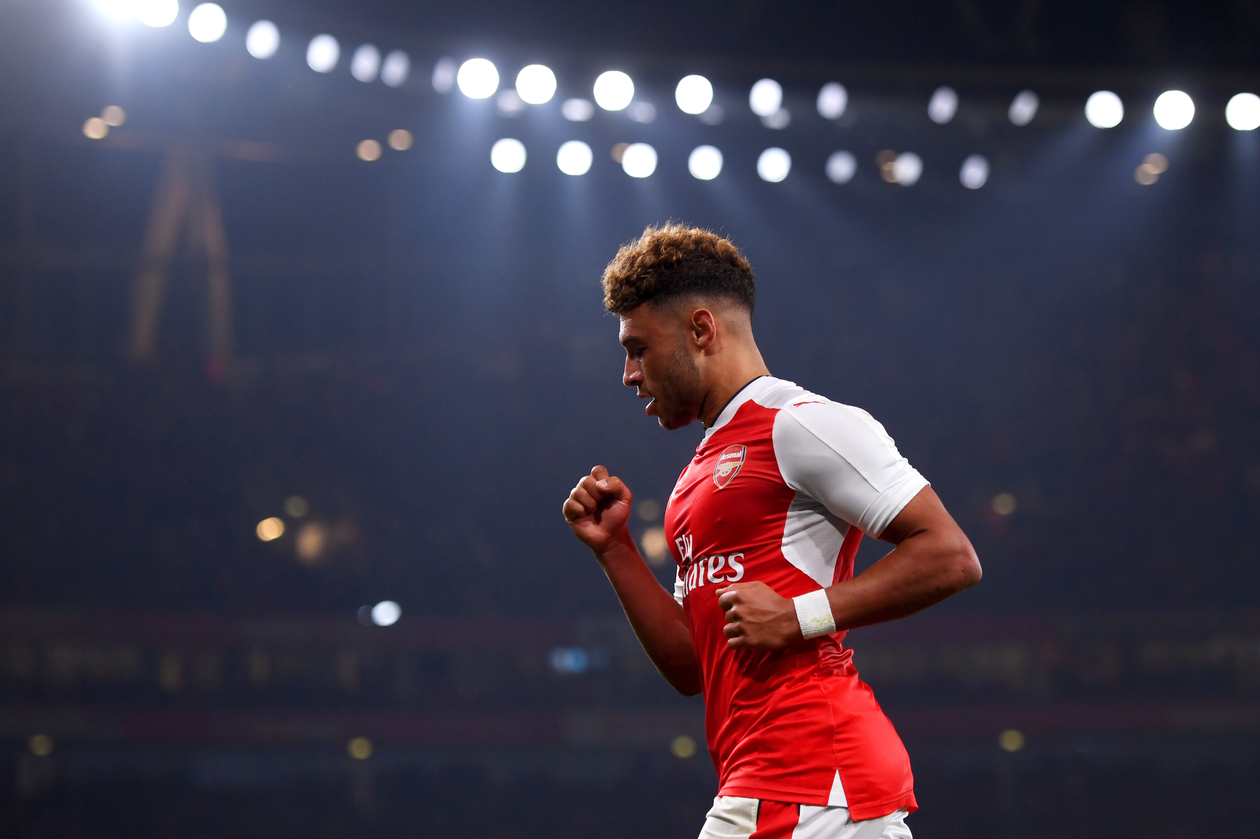 LONDON, ENGLAND - OCTOBER 25:  Alex Oxlade-Chamberlain of Arsenal celebrates scoring his sides first goal during the EFL Cup fourth round match between Arsenal and Reading at Emirates Stadium on October 25, 2016 in London, England.  (Photo by Michael Regan/Getty Images)