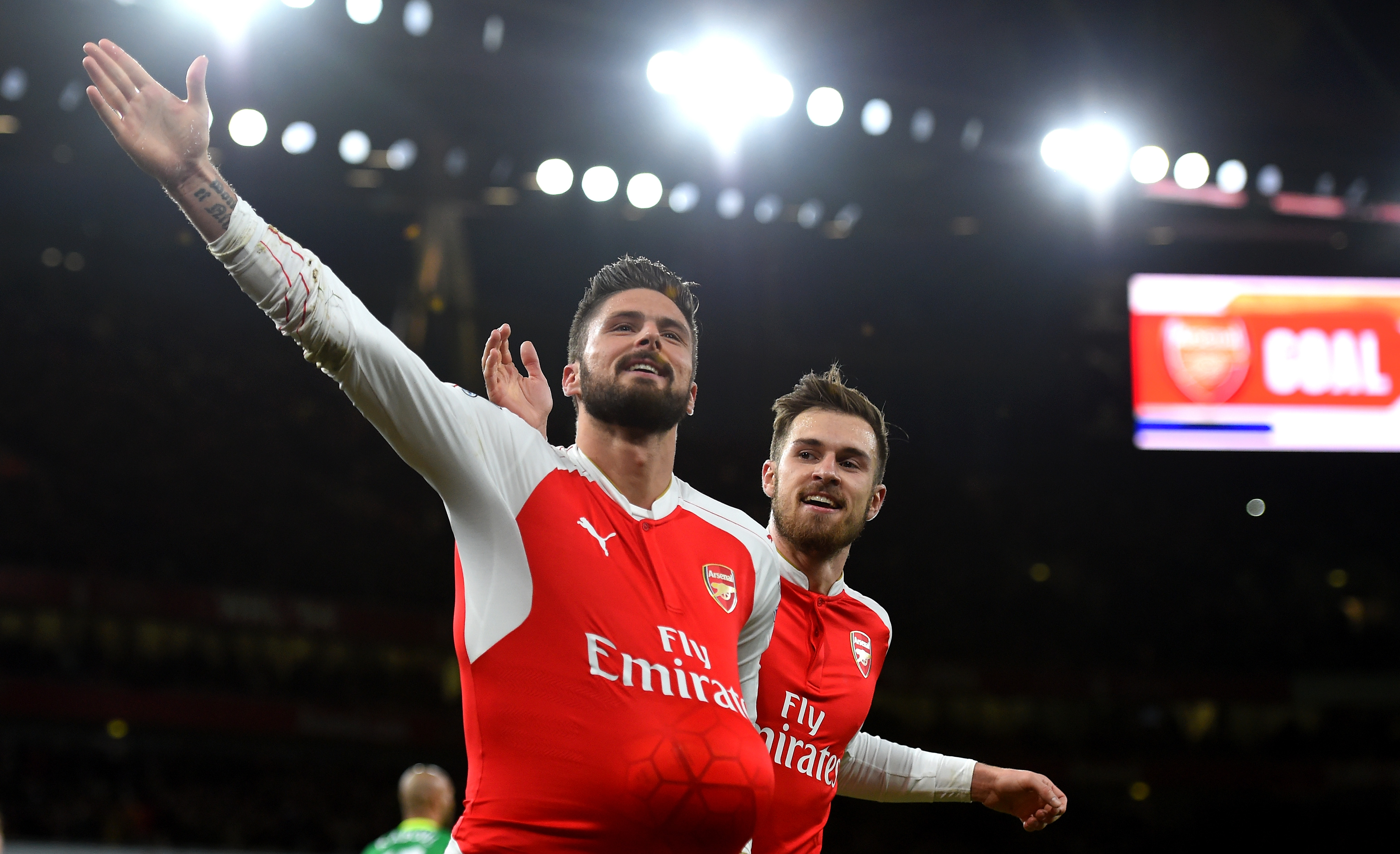LONDON, ENGLAND - DECEMBER 05:  Olivier Giroud (L) of Arsenal celebrates scoring his team's second goal with his team mate Aaron Ramsey (R)during the Barclays Premier League match between Arsenal and Sunderland at Emirates Stadiumon December 5, 2015 in London, England.  (Photo by Shaun Botterill/Getty Images)