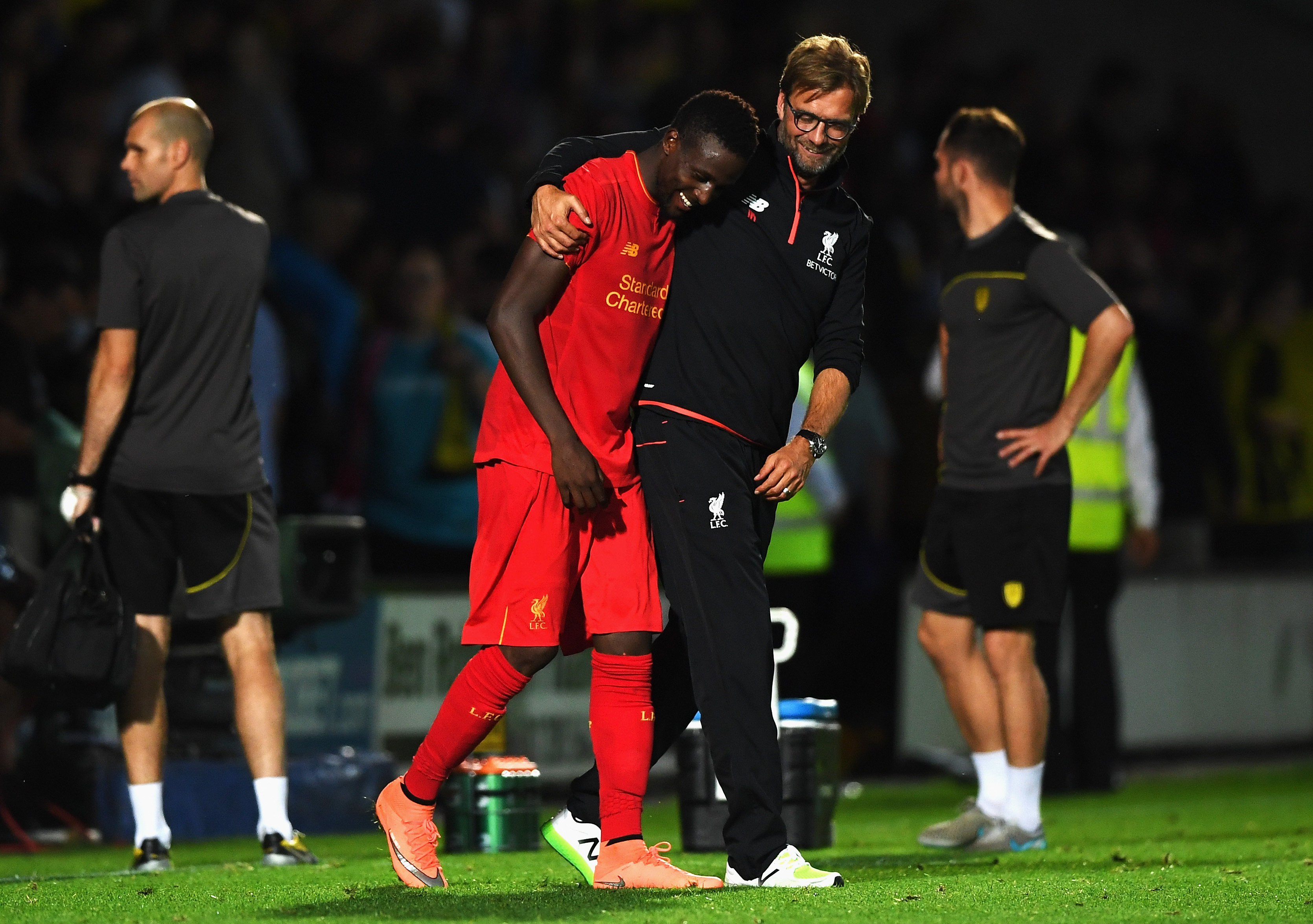 BURTON UPON TRENT, ENGLAND - AUGUST 23:  Jurgen Klopp, Manager of Liverpool celebrates with Divock Origi of Liverpool after the EFL Cup second round match between Burton Albion and Liverpool at Pirelli Stadium on August 23, 2016 in Burton upon Trent, England.  (Photo by Gareth Copley/Getty Images)