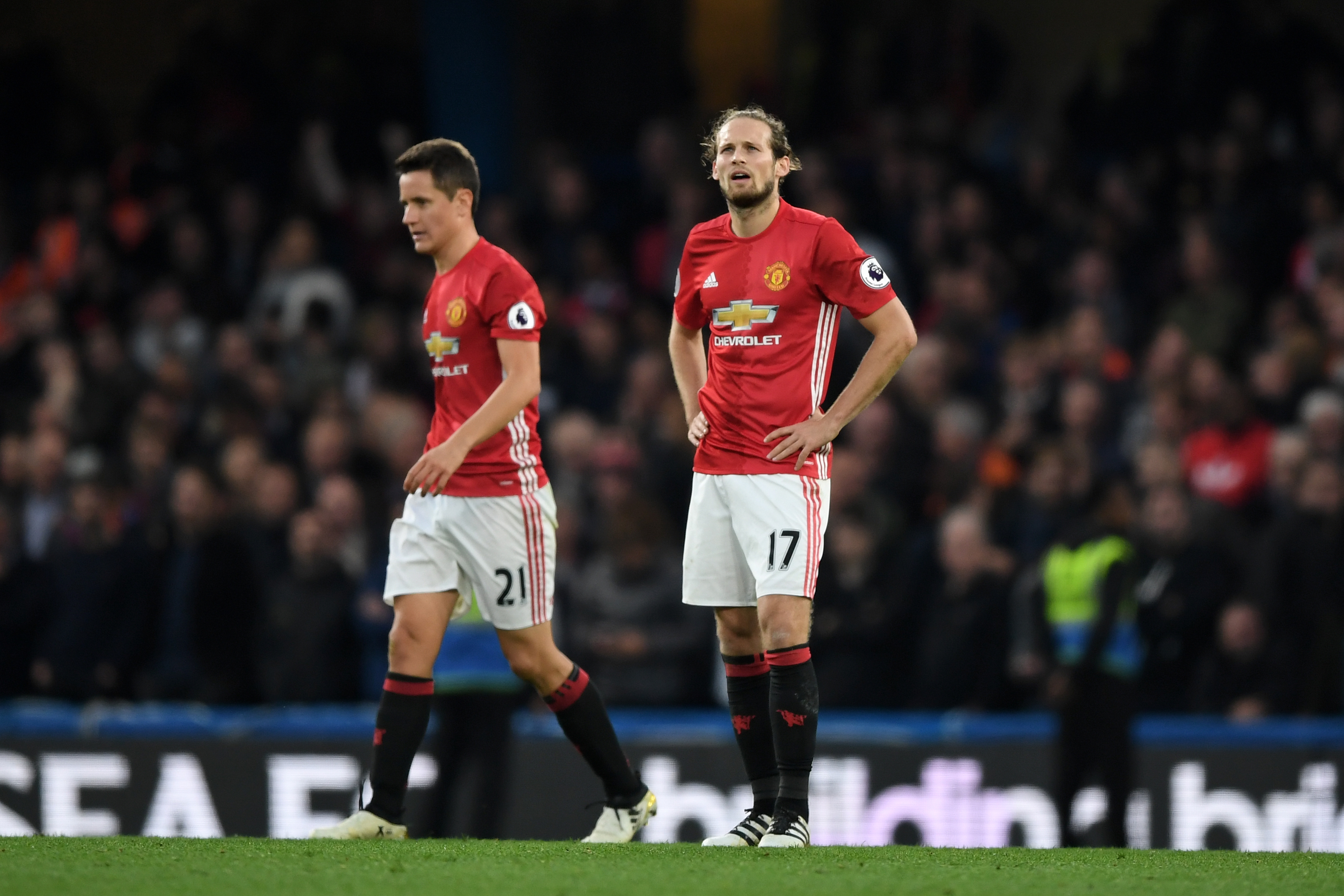 LONDON, ENGLAND - OCTOBER 23:  Daley Blind and Ander Herrera of Manchester United look dejected during the Premier League match between Chelsea and Manchester United at Stamford Bridge on October 23, 2016 in London, England.  (Photo by Shaun Botterill/Getty Images)