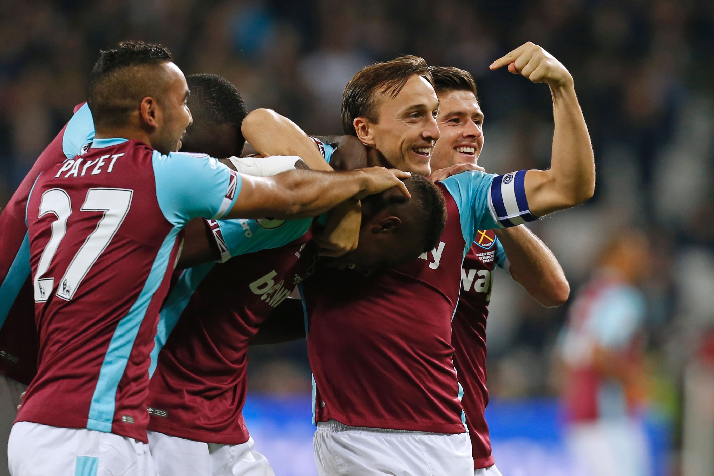 West Ham United's Swiss midfielder Edimilson Fernandes (C) celebrates with teammates after scoring their second goal during the EFL (English Football League) Cup fourth round match between West Ham United and Chelsea at The London Stadium in east London on October 26, 2016. / AFP / Ian KINGTON / RESTRICTED TO EDITORIAL USE. No use with unauthorized audio, video, data, fixture lists, club/league logos or 'live' services. Online in-match use limited to 75 images, no video emulation. No use in betting, games or single club/league/player publications.  /         (Photo credit should read IAN KINGTON/AFP/Getty Images)