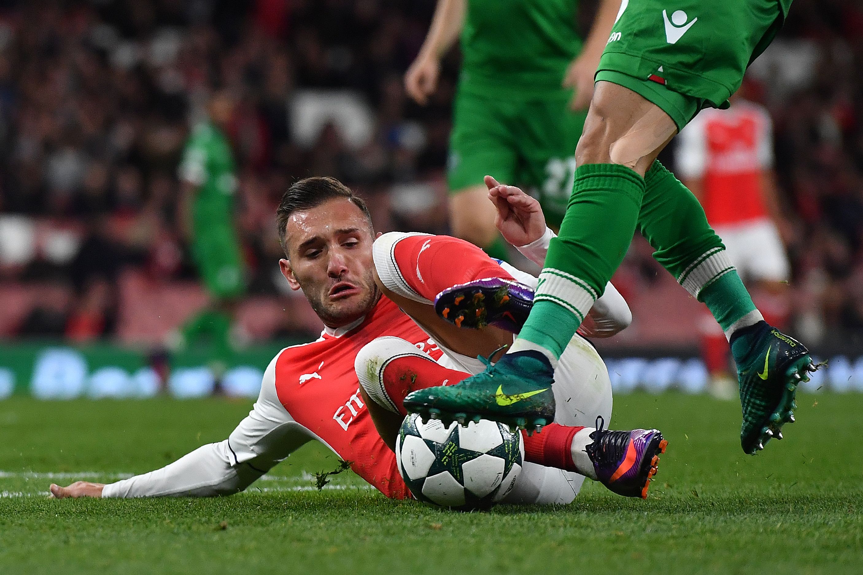 Arsenal's Spanish striker Lucas Perez (L) vies with Ludogorets' Brazilian defender Natanael Batista Pimienta during the UEFA Champions League Group A football match between Arsenal and Ludogorets Razgrad at The Emirates Stadium in London on October 19, 2016. / AFP / BEN STANSALL        (Photo : BEN STANSALL/AFP/Getty Images)