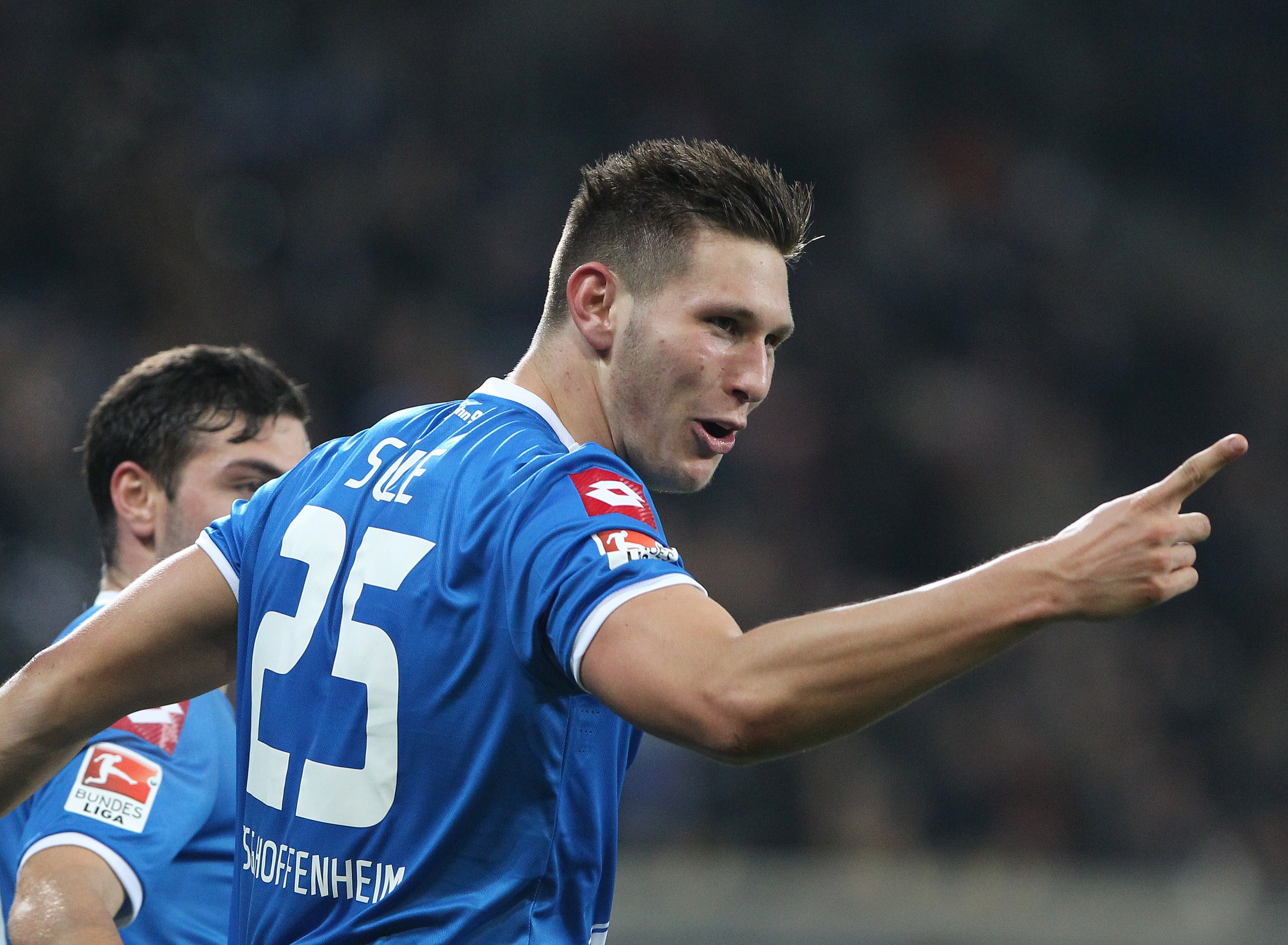 Hoffenheim's defender Niklas Suele celebrates scoring the 4-2 during the German first division Bundesliga football match 1899 Hoffenheim vs Hannover 96 in Sinsheim, southwestern Germany, on November 29, 2014.      AFP PHOTO / DANIEL ROLAND

RESTRICTIONS / EMBARGO  DFL RULES TO LIMIT THE ONLINE USAGE DURING MATCH TIME TO 15 PICTURES PER MATCH. IMAGE SEQUENCES TO SIMULATE VIDEO IS NOT ALLOWED AT ANY TIME. FOR FURTHER QUERIES PLEASE CONTACT DFL DIRECTLY AT + 49 69 650050.        (Photo credit should read DANIEL ROLAND/AFP/Getty Images)
