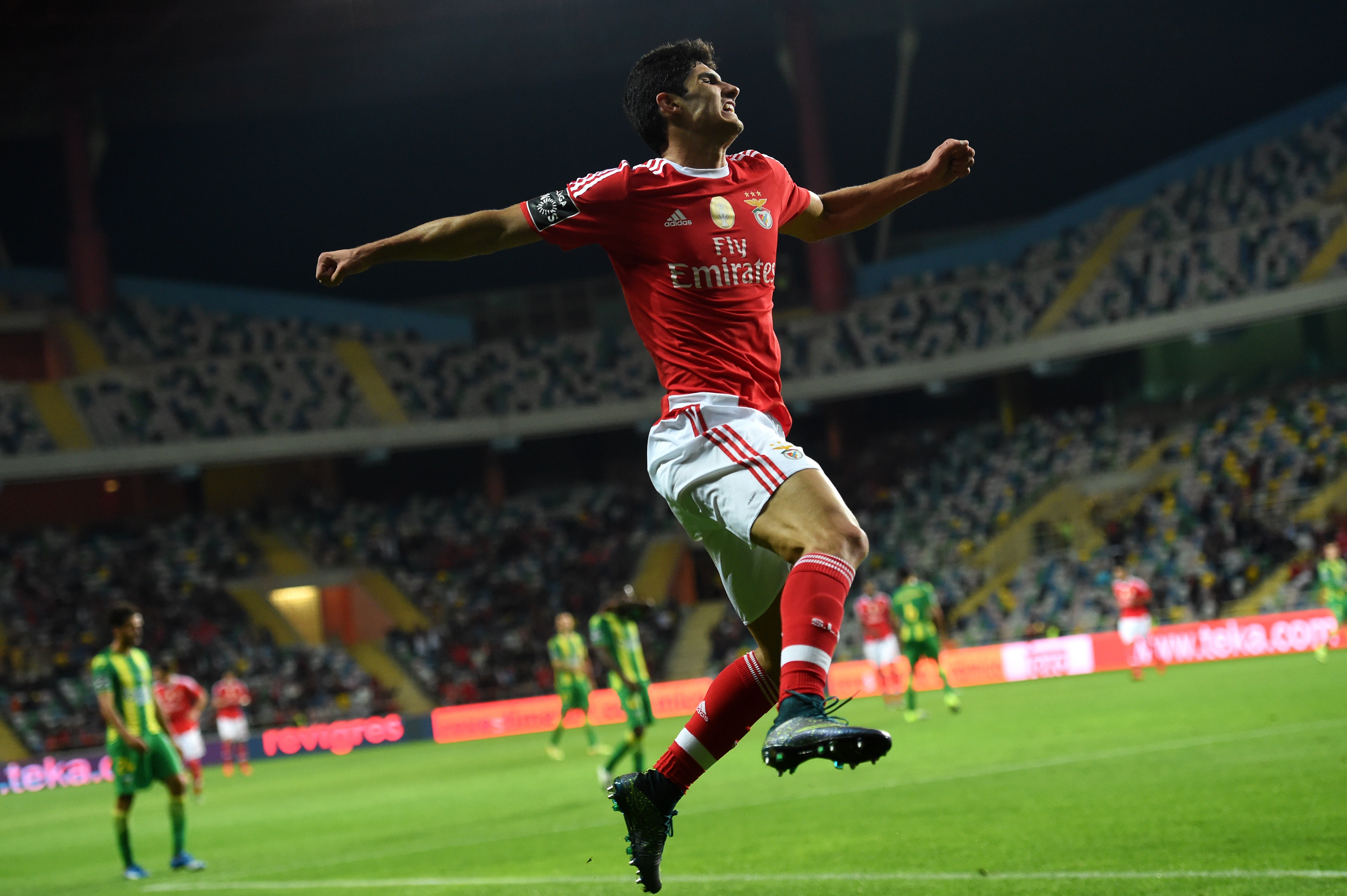 Benfica's forward Goncalo Guedes celebrates after scoring a goal during the Portuguese league football match CD Tondela vs SL Benfica at the Aveiro Municipal stadium in Aveiro on October 30, 2015.  AFP PHOTO / FRANCISCO LEONG        (Photo credit should read FRANCISCO LEONG/AFP/Getty Images)