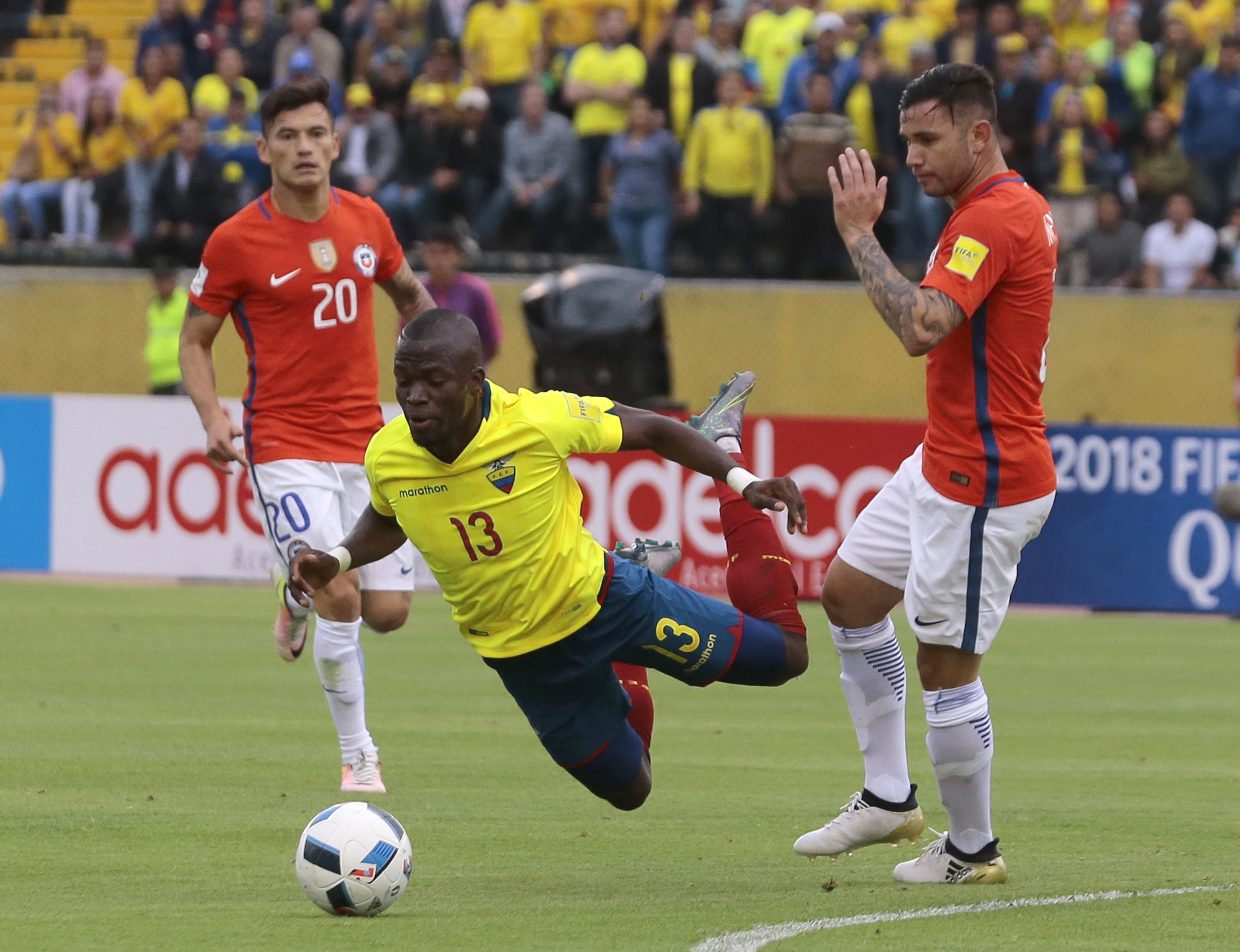 Ecuador's Enner Valencia falls on the ground during the Russia 2018 World Cup football qualifier match against Chile in Quito, on October 6, 2016. / AFP / Juan Cevallos        (Photo credit should read JUAN CEVALLOS/AFP/Getty Images)