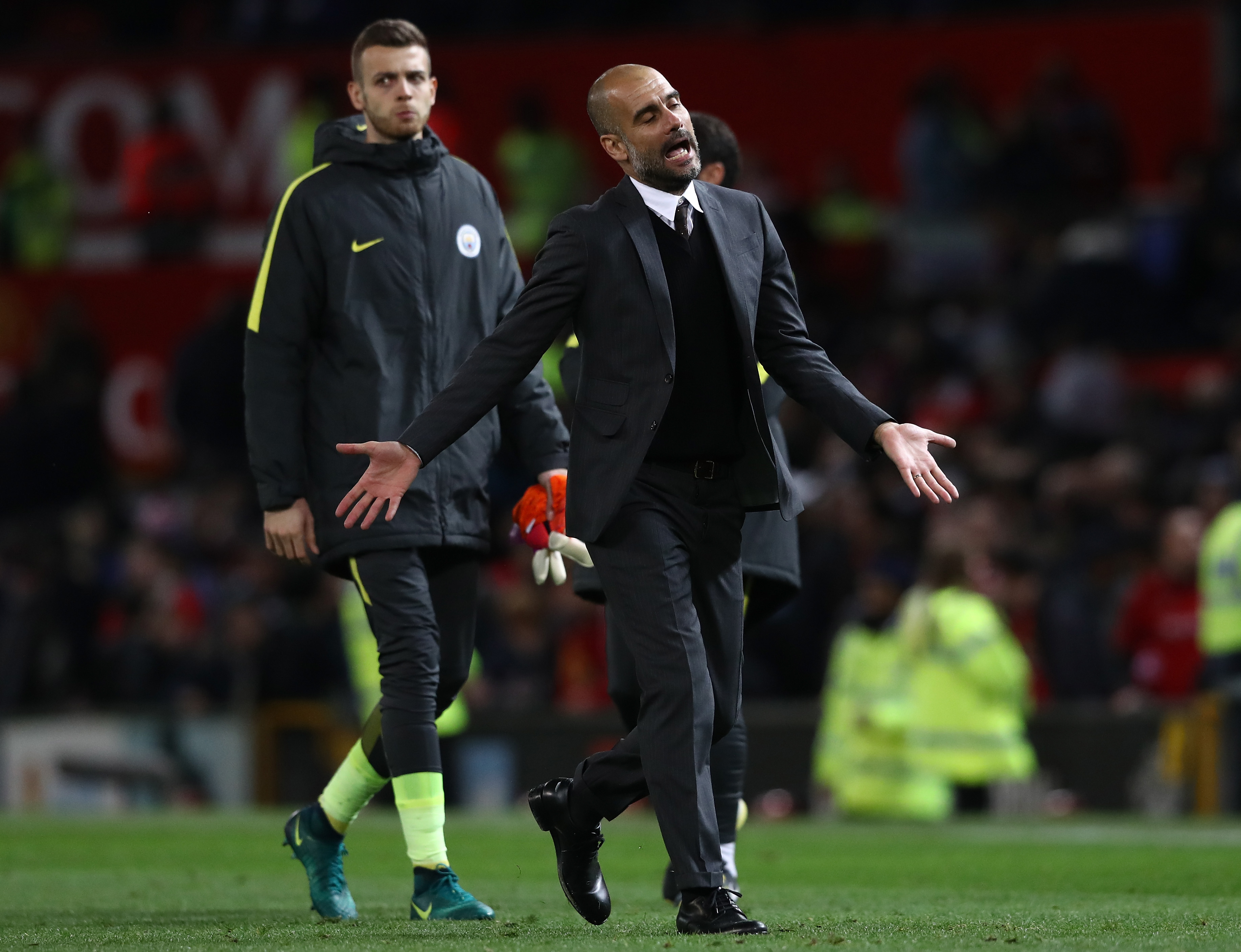 MANCHESTER, ENGLAND - OCTOBER 26:  Josep Guardiola, Manager of Manchester City reacts during the EFL Cup fourth round match between Manchester United and Manchester City at Old Trafford on October 26, 2016 in Manchester, England.  (Photo by David Rogers/Getty Images)