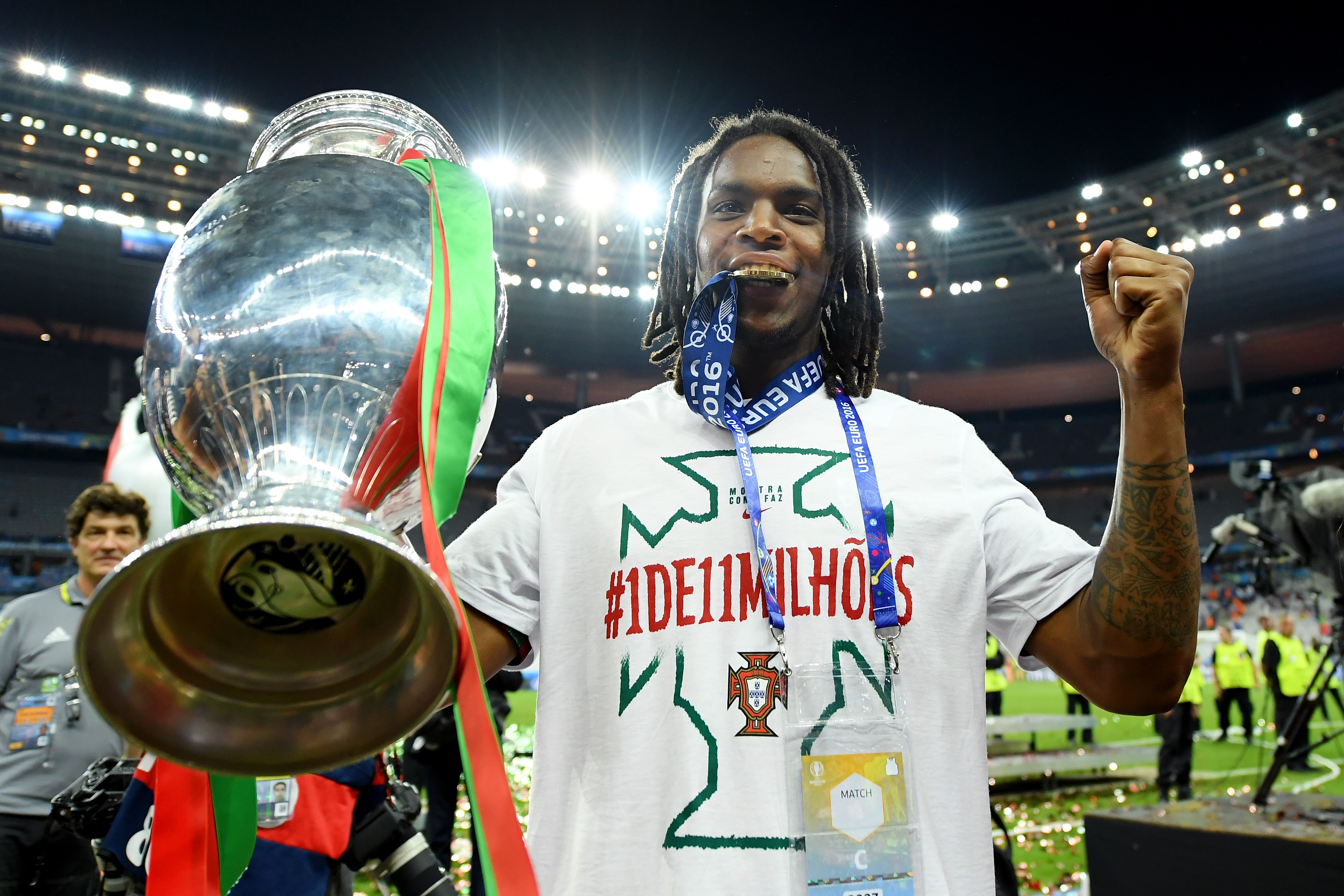 PARIS, FRANCE - JULY 10:  Renato Sanches of Portugal holds the Henri Delaunay trophy to celebrate after his team's 1-0 win against France in the UEFA EURO 2016 Final match between Portugal and France at Stade de France on July 10, 2016 in Paris, France.  (Photo by Matthias Hangst/Getty Images)