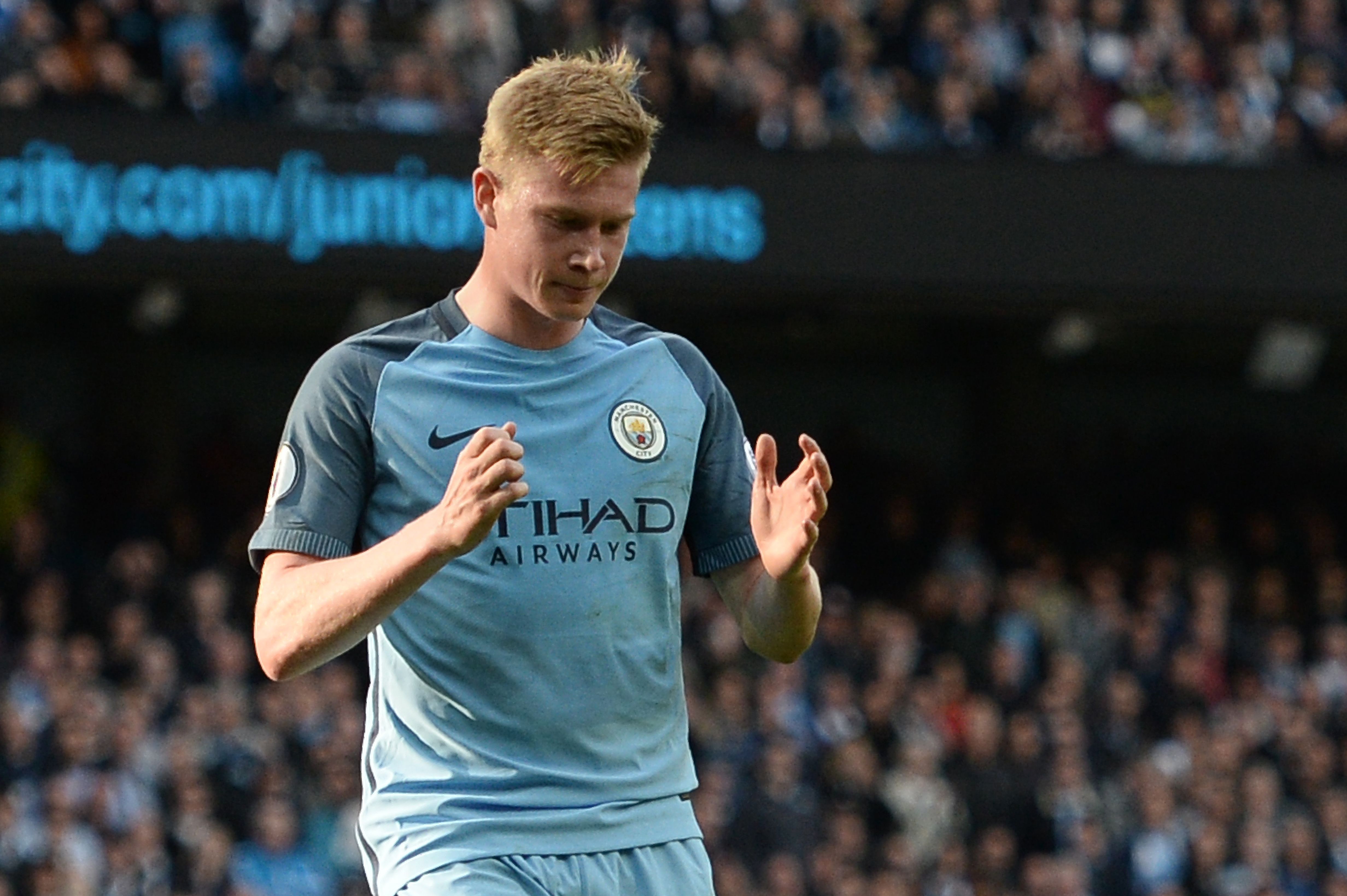 Manchester City's Belgian midfielder Kevin De Bruyne reacts after missing a penalty during the English Premier League football match between Manchester City and Everton at the Etihad Stadium in Manchester, north west England, on October 15, 2016. / AFP / OLI SCARFF / RESTRICTED TO EDITORIAL USE. No use with unauthorized audio, video, data, fixture lists, club/league logos or 'live' services. Online in-match use limited to 75 images, no video emulation. No use in betting, games or single club/league/player publications.  /         (Photo credit should read OLI SCARFF/AFP/Getty Images)