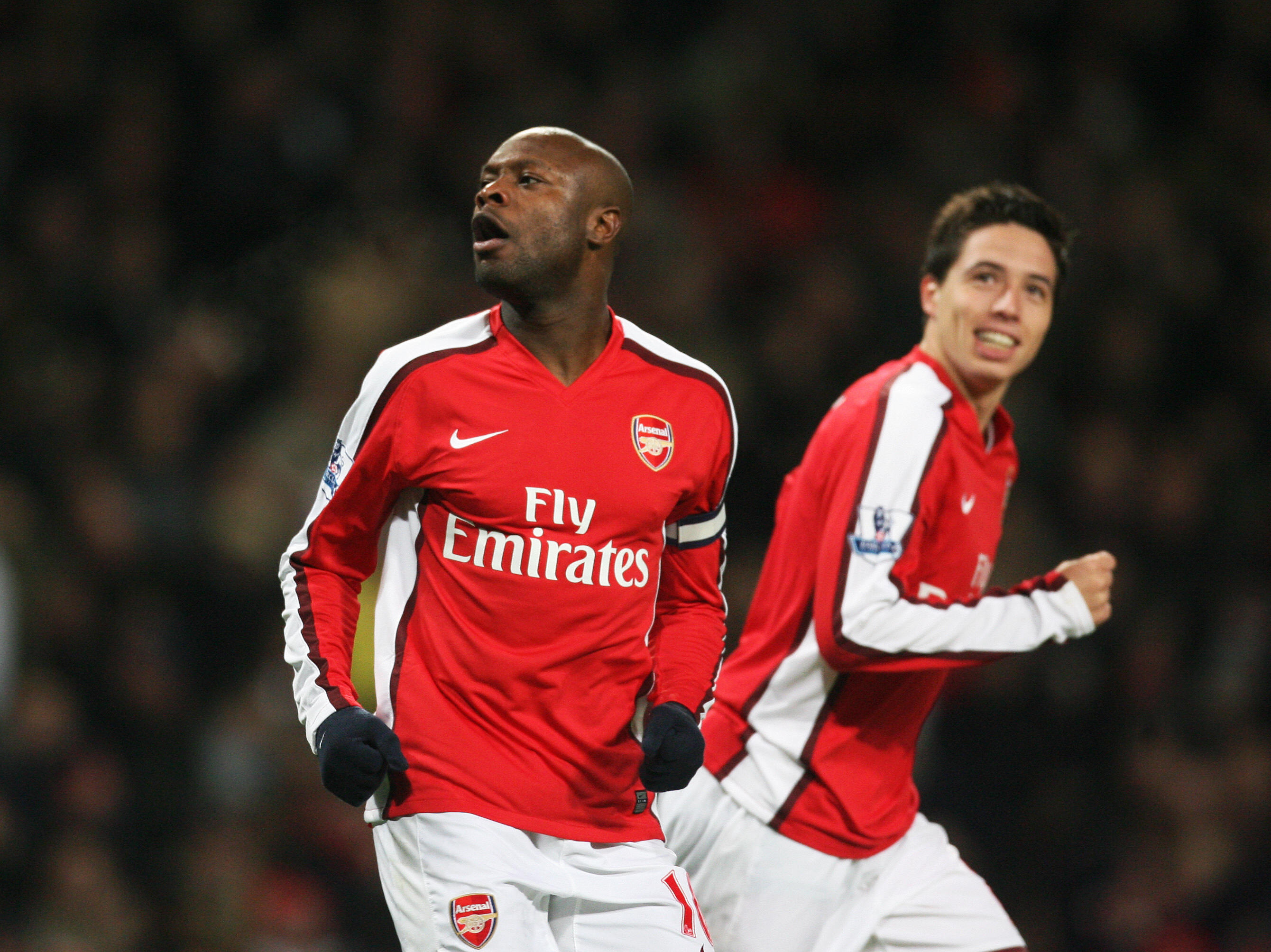 Arsenal's William Gallas celebrates scoring the goal to make it 2-1 against Tottenham Hotspur with Samir Nasri (R) during their Barclays Premiership football match at The Emirates Stadium in London, on October 29, 2008. AFP PHOTO/Chris Ratcliffe  Mobile and website use of domestic English football pictures are subject to obtaining a Photographic End User Licence from Football DataCo Ltd Tel : +44 (0) 207 864 9121 or e-mail accreditations@football-dataco.com - applies to Premier and Football League matches. (Photo credit should read CHRIS RATCLIFFE/AFP/Getty Images)