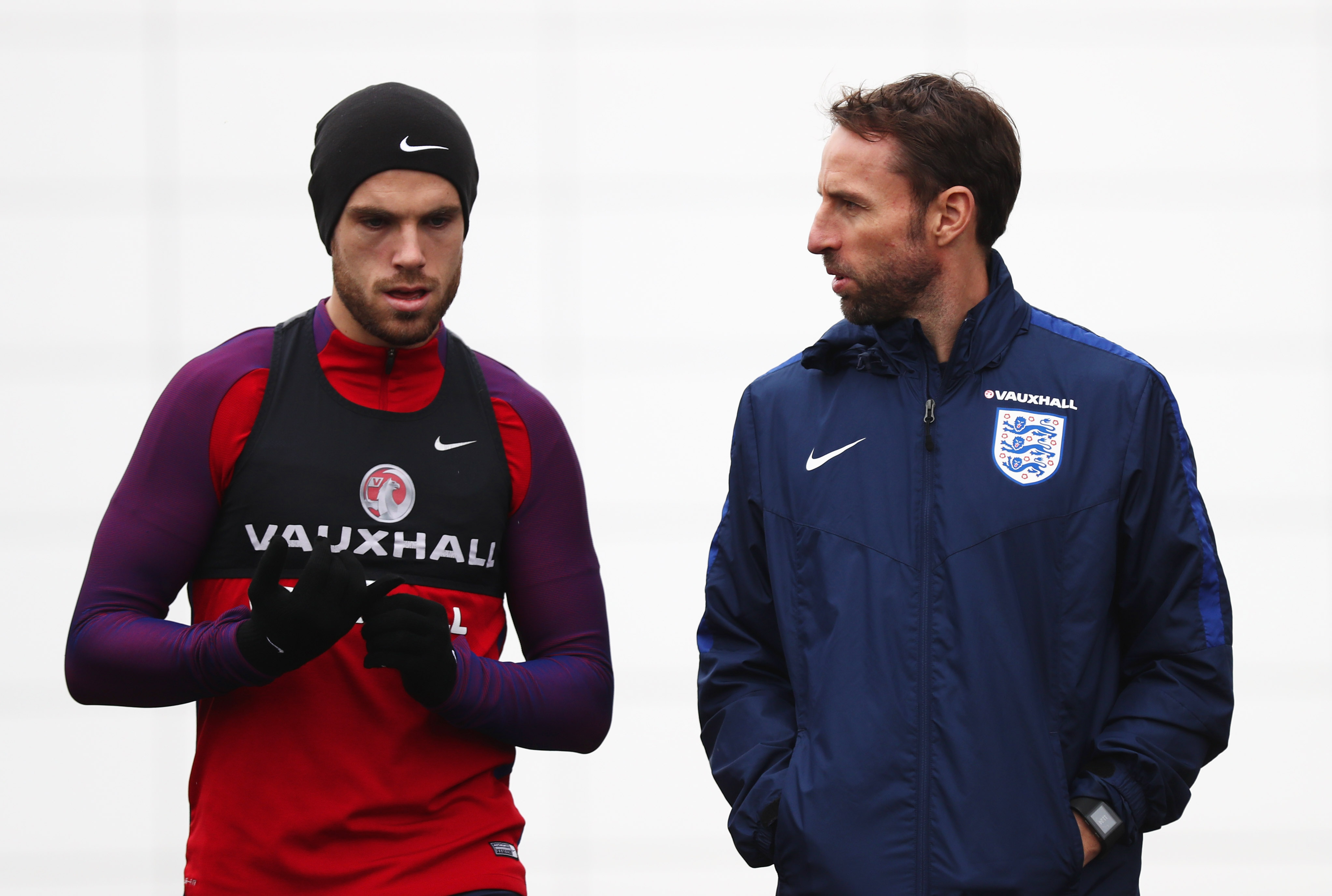 ENFIELD, ENGLAND - NOVEMBER 14:  Jordan Henderson and Gareth Southgate interim manager of England in discussion during an England training session on the eve of their international friendly match against Spain at Tottenham Hotspur Training Centre on November 14, 2016 in Enfield, England.  (Photo by Clive Rose/Getty Images)