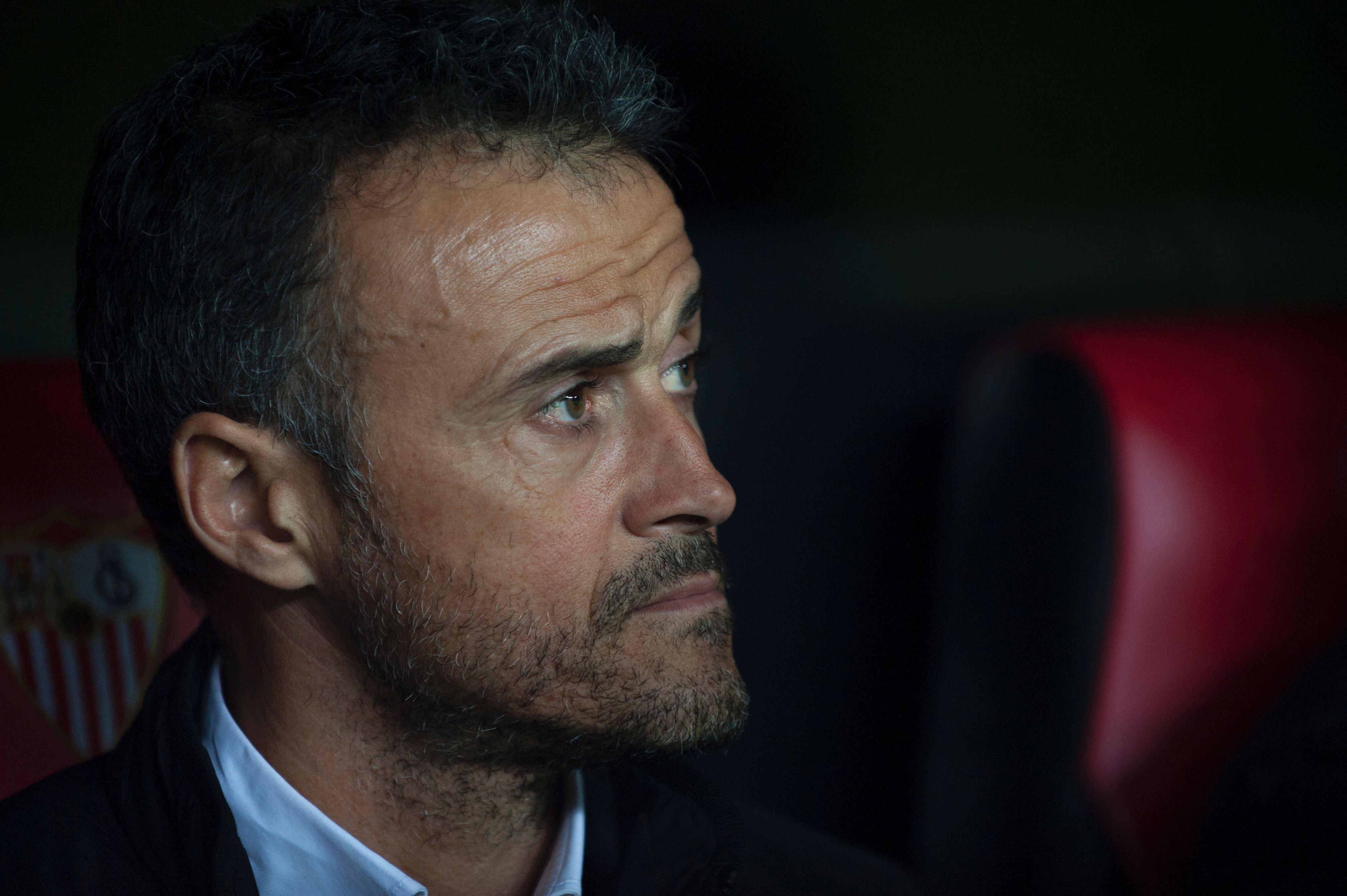 Barcelona's coach Luis Enrique looks on before during the Spanish league football match Sevilla FC vs FC Barcelona at the Ramon Sanchez Pizjuan stadium in Sevilla on November 6, 2016. / AFP / JORGE GUERRERO        (Photo credit should read JORGE GUERRERO/AFP/Getty Images)