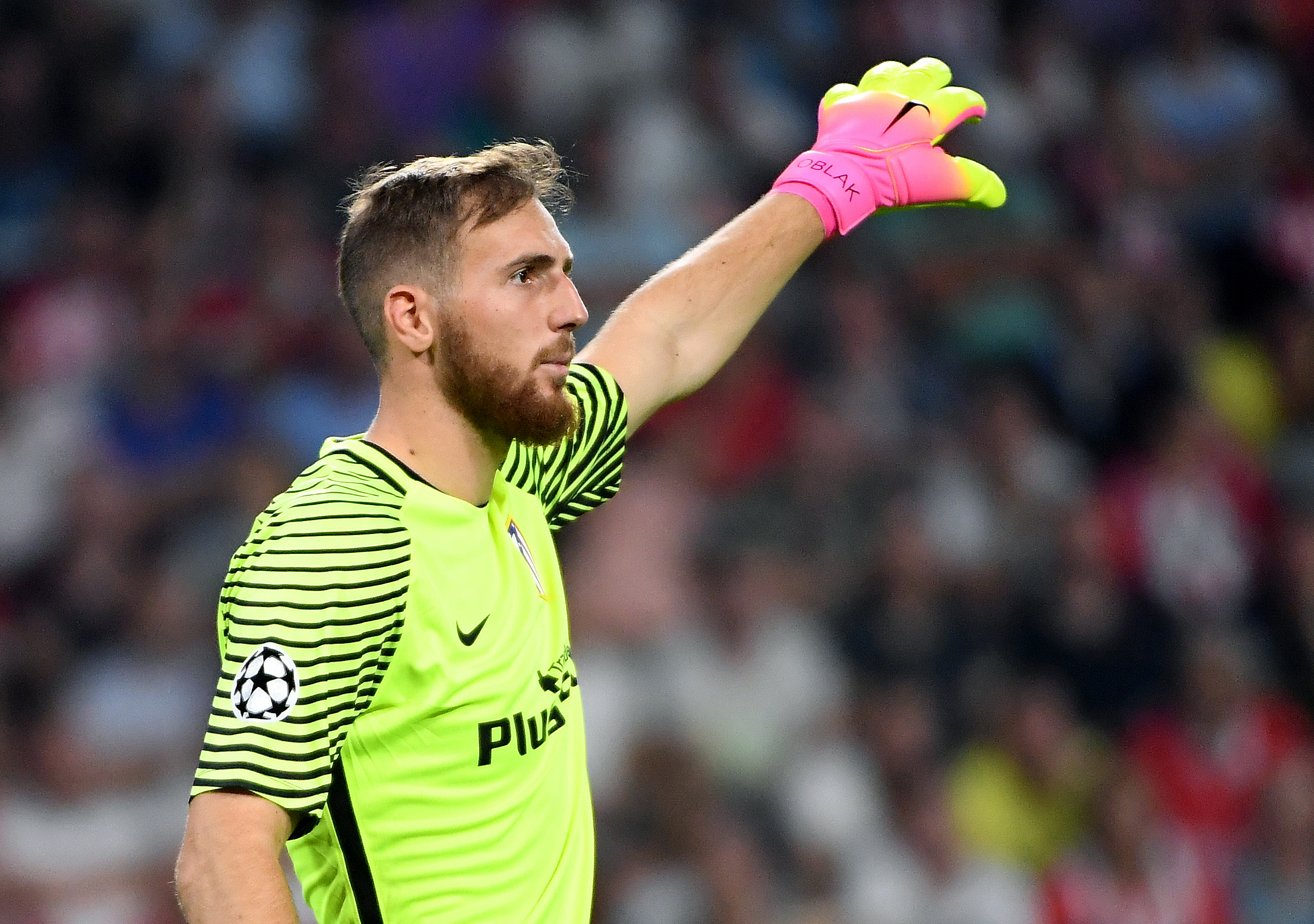 Atletico Madrid's Slovenian goalkeeper Jan Oblak gestures during the UEFA Champions League football match between PSV Eindhoven and Atletico Madrid at Philips Stadium on September 13, 2016, in Eindhoven, The Netherlands. / AFP / EMMANUEL DUNAND        (Photo credit should read EMMANUEL DUNAND/AFP/Getty Images)