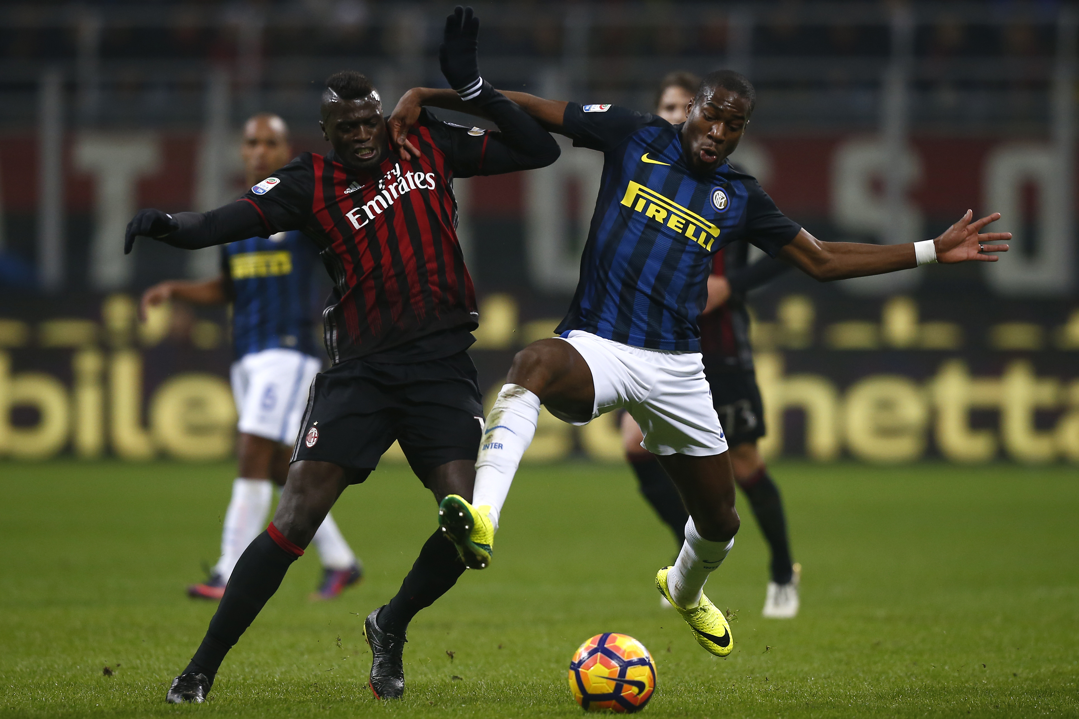 AC Milan's forward Mbaye Niang of France (L) fights for the ball with Inter Milan's midfielder Geoffrey Kondogbia from France during the Italian Serie A football match AC Milan Vs Inter Milan on November 20, 2016 at the 'San Siro Stadium' in Milan.  / AFP / MARCO BERTORELLO        (Photo credit should read MARCO BERTORELLO/AFP/Getty Images)