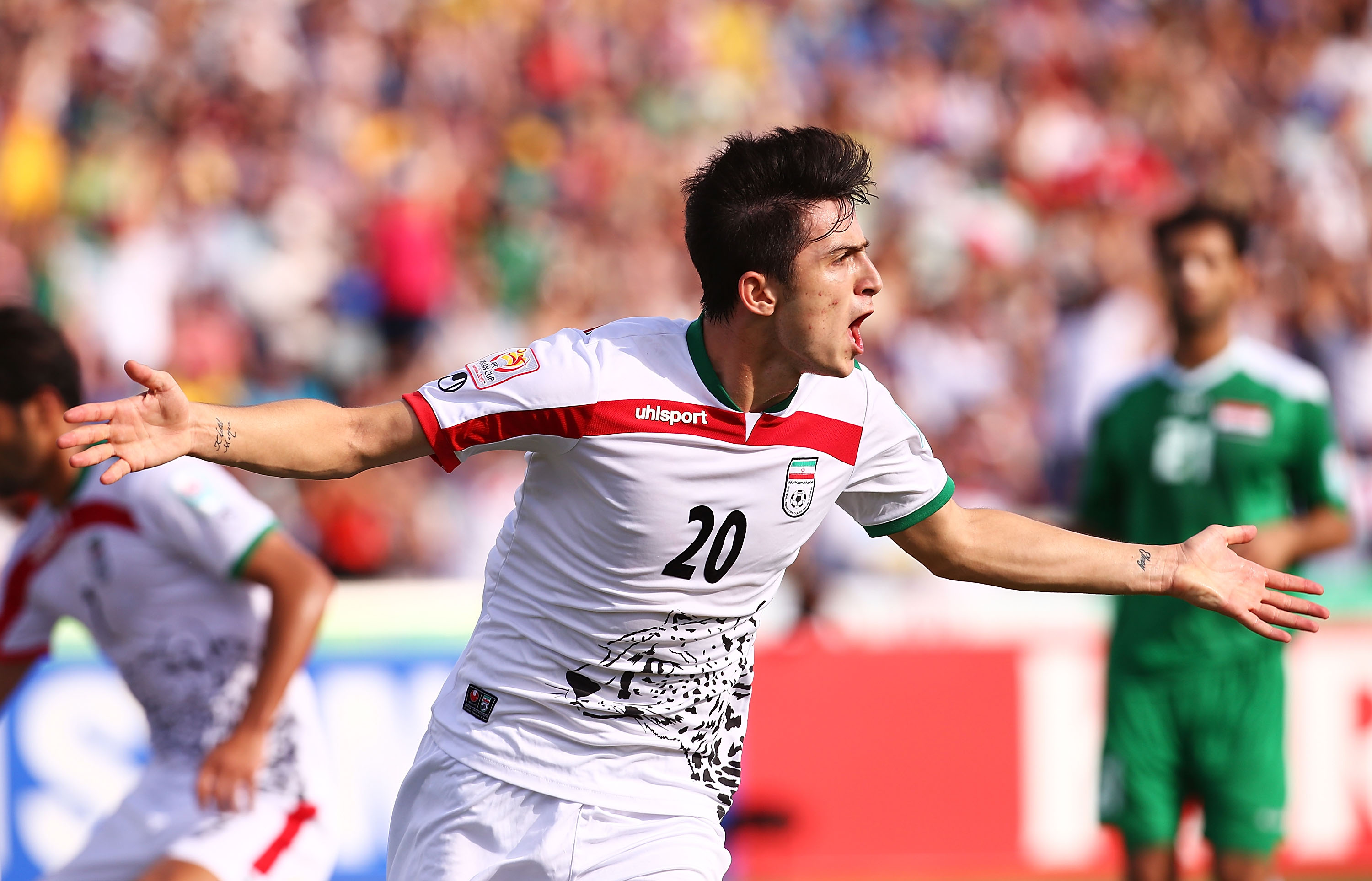 CANBERRA, AUSTRALIA - JANUARY 23: Sardar Azmoun of Iran celebrates scoring a goal during the 2015 Asian Cup match between Iran and Iraq at Canberra Stadium on January 23, 2015 in Canberra, Australia.  (Photo by Mark Nolan/Getty Images)