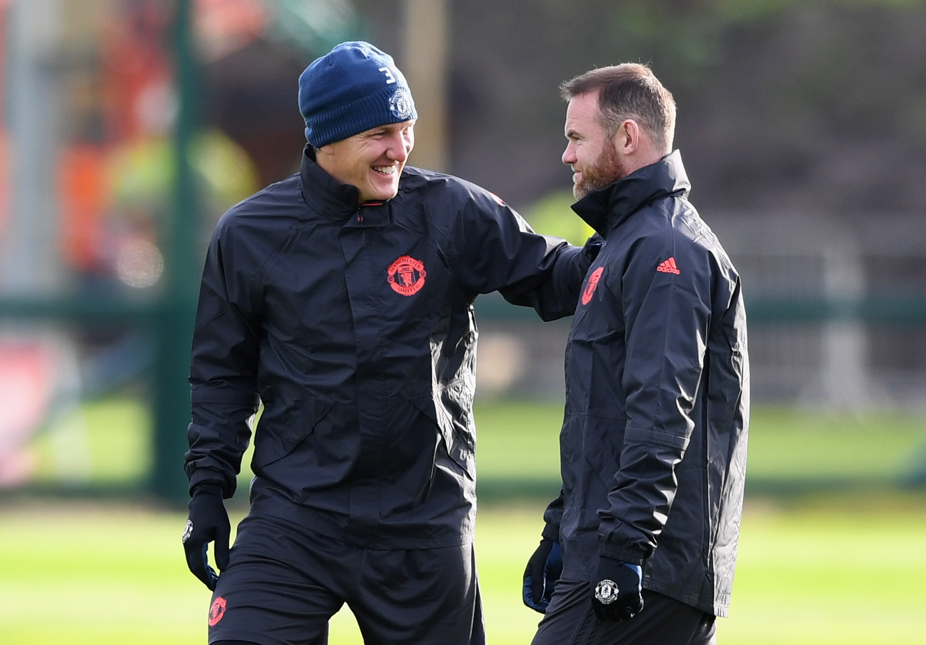 MANCHESTER, ENGLAND - NOVEMBER 23:  Wayne Rooney and Bastian Schweinsteiger in discussion during a Manchester United training session on the eve of their UEFA Europa League match against Feyenoord at Aon Training Complex on November 23, 2016 in Manchester, England.  (Photo by Gareth Copley/Getty Images)