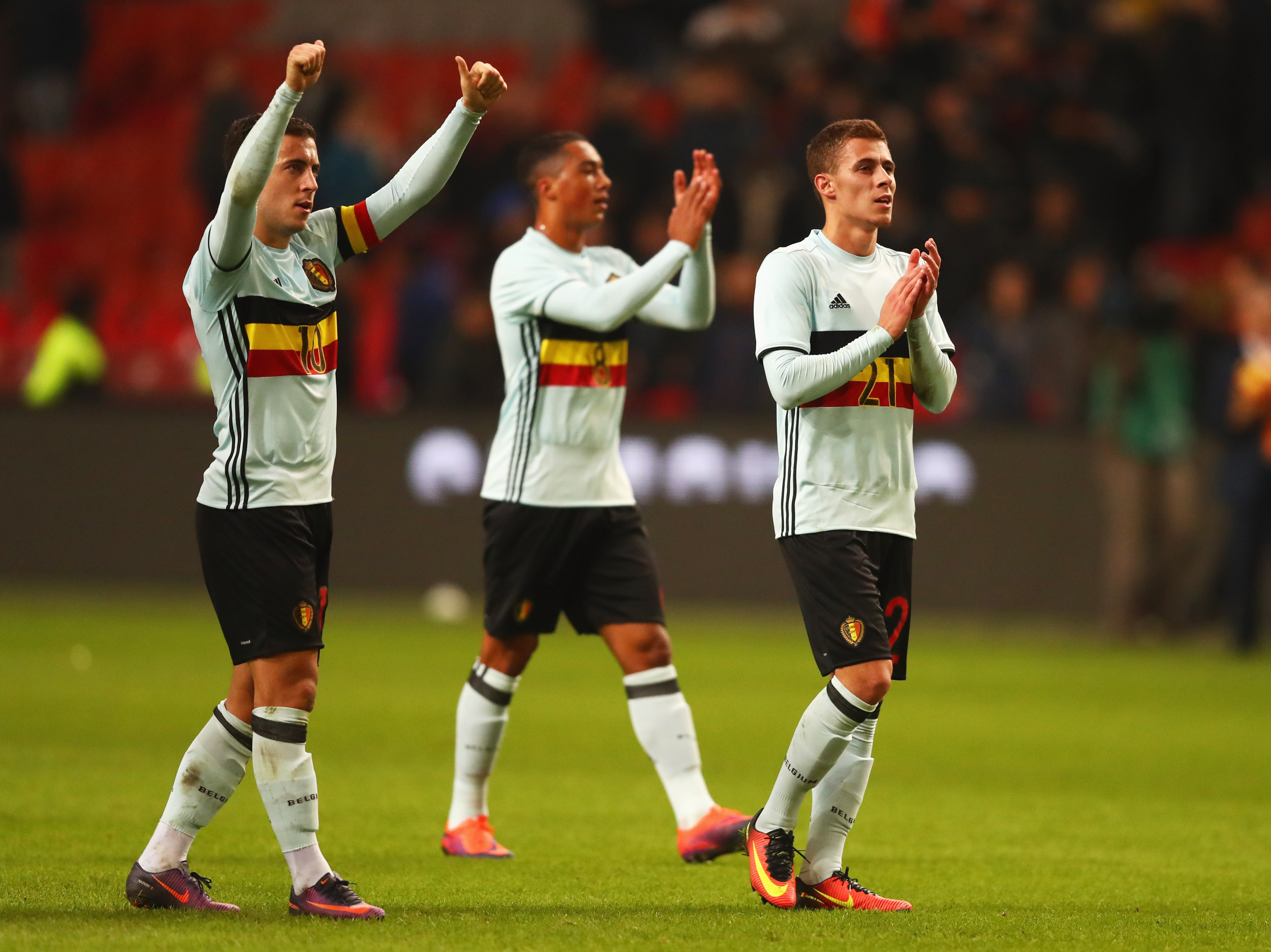 AMSTERDAM, NETHERLANDS - NOVEMBER 09:  Thorgan Hazard and Eden Hazard of Belgium (L) applaud the travelling fans after the international friendly match between Netherlands and Belgium at Amsterdam Arena on November 9, 2016 in Amsterdam, Netherlands.  (Photo by Dean Mouhtaropoulos/Getty Images)