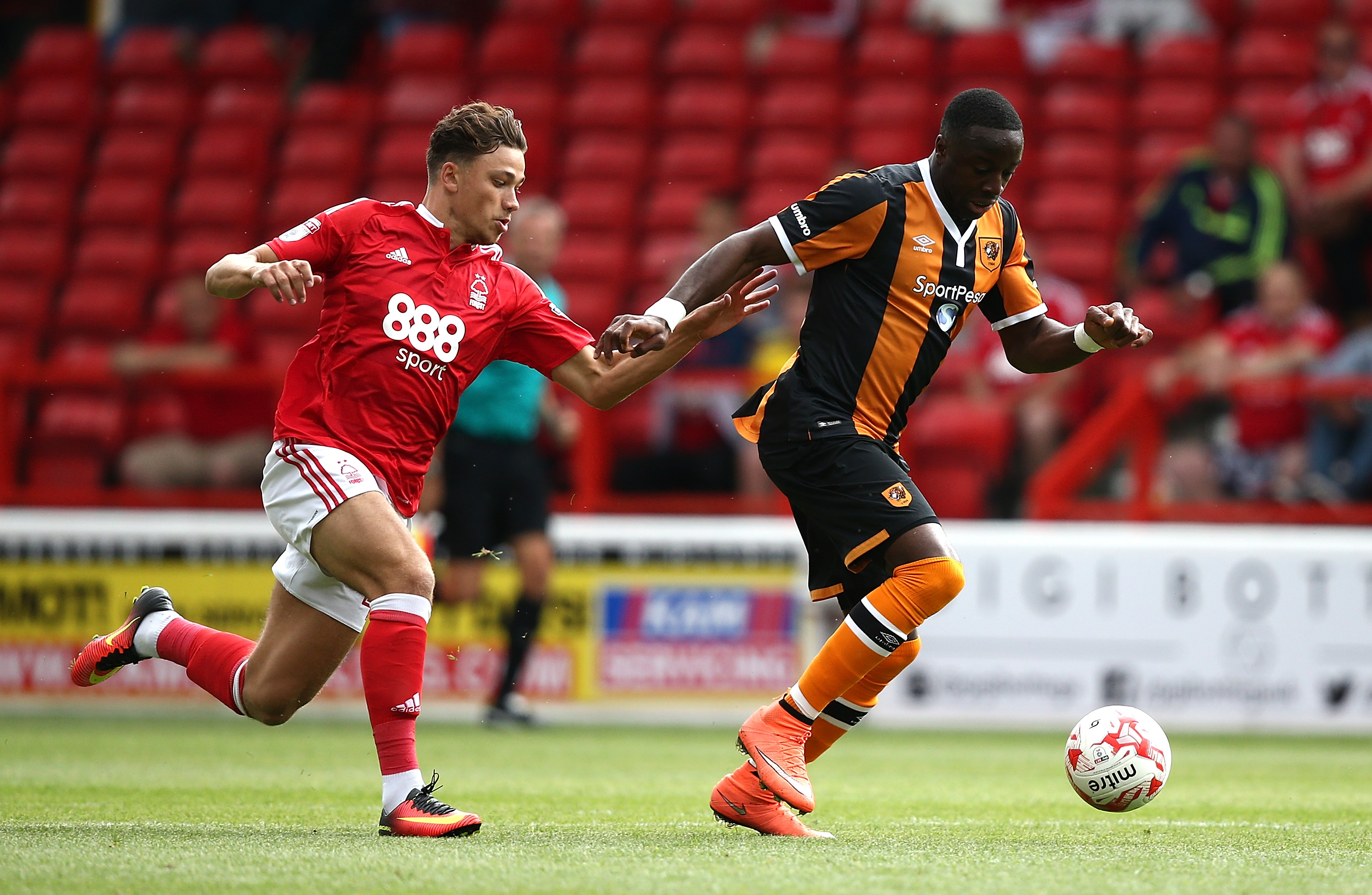 NOTTINGHAM, ENGLAND - JULY 30:  Adama Diomande of Hull City battles with Matty Cash of Nottingham Forest during the pre-season friendly match between Nottingham Forest and Hull City at City Ground on July 30, 2016 in Nottingham, England.  (Photo by Jan Kruger/Getty Images)